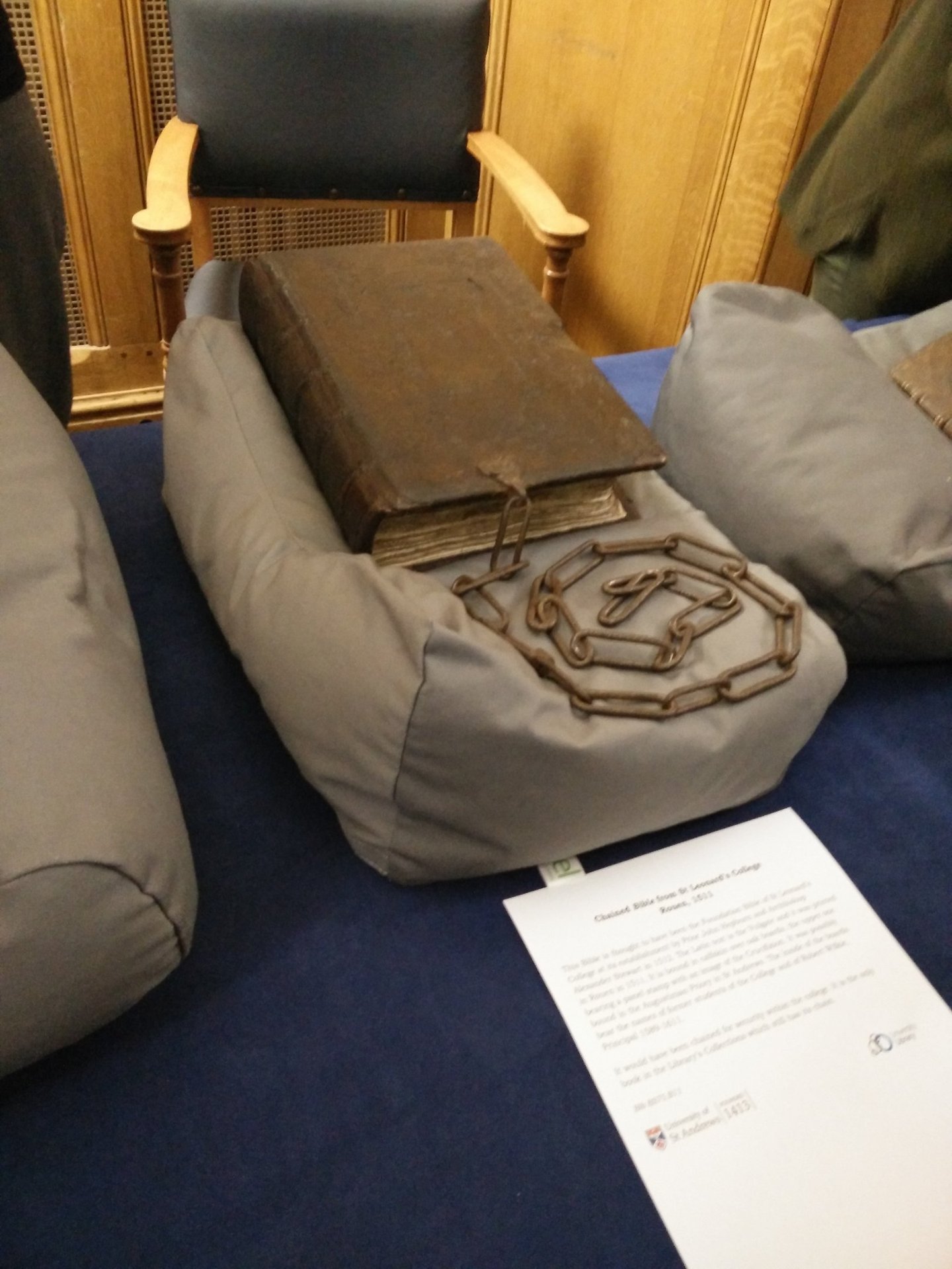 A bound manuscript with a chain.