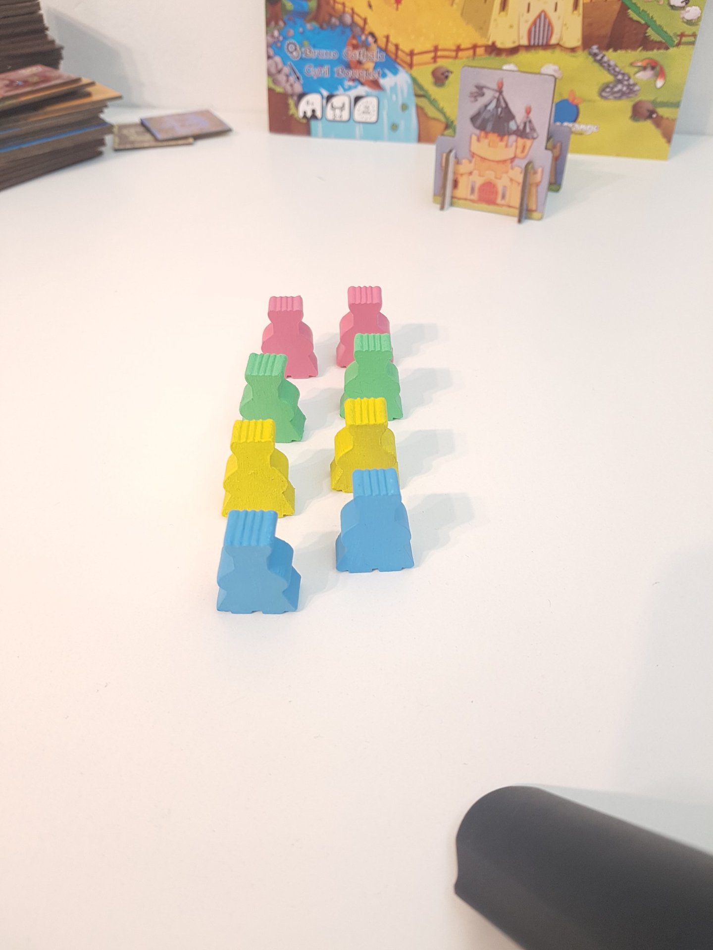 a group of meeples on a table
