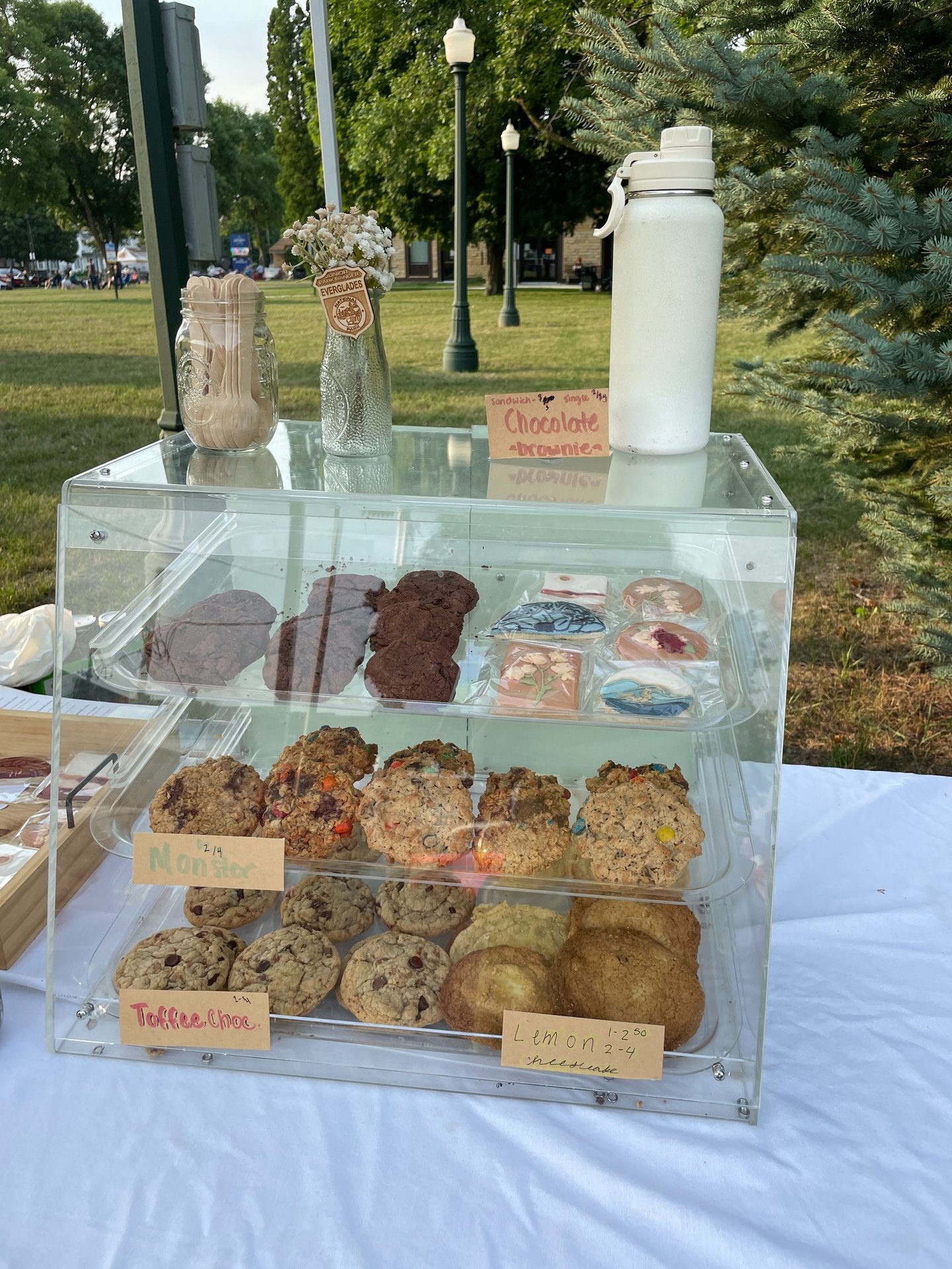 many assorted delicious baked goods in a case baked fresh daily