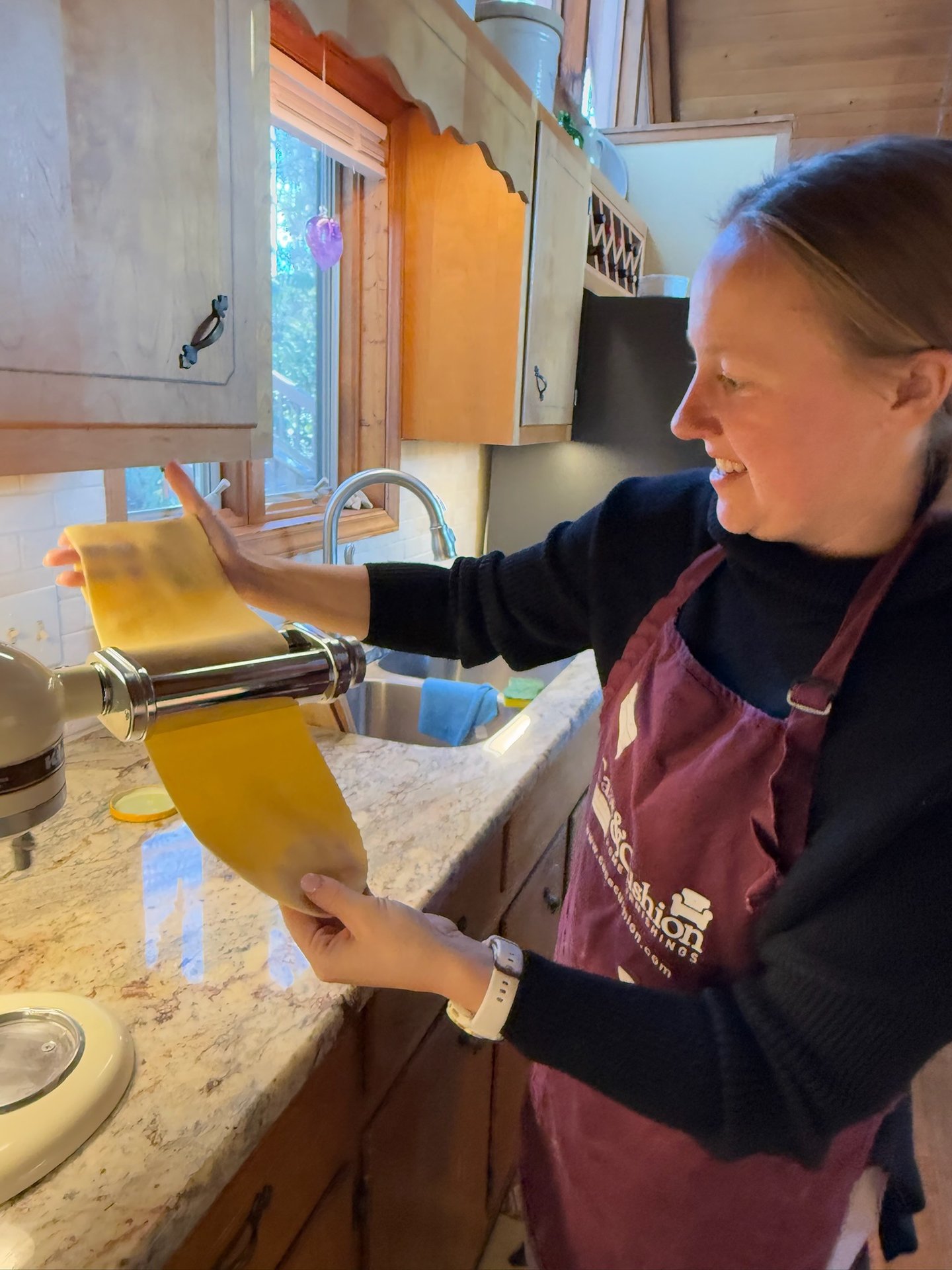 Class participant making an authentic pasta noodle