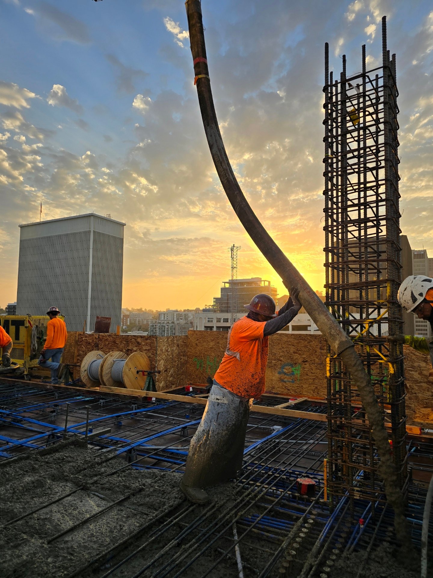 a man is working a large cement pump