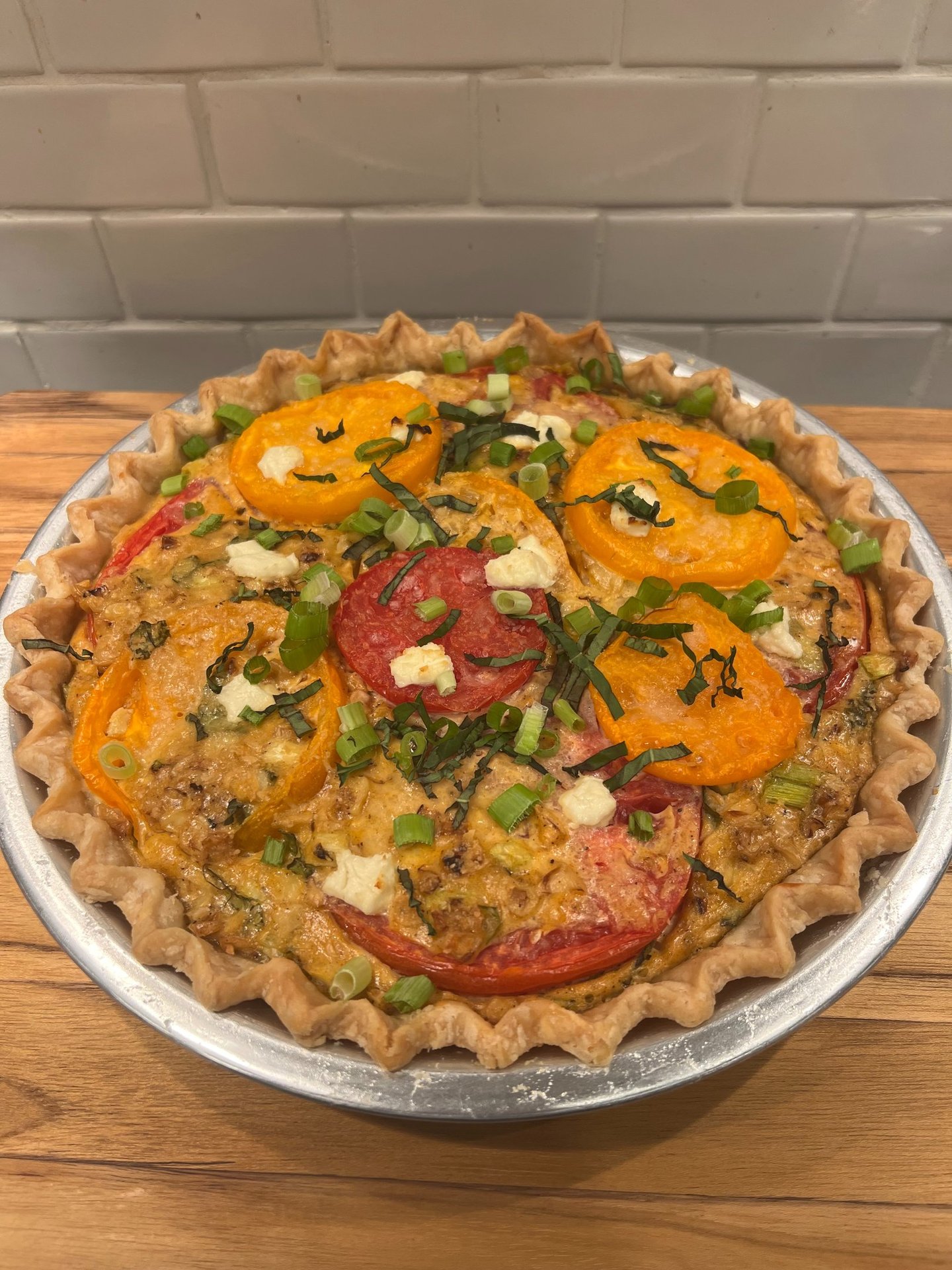 tomato roasted corn and goat cheese pie