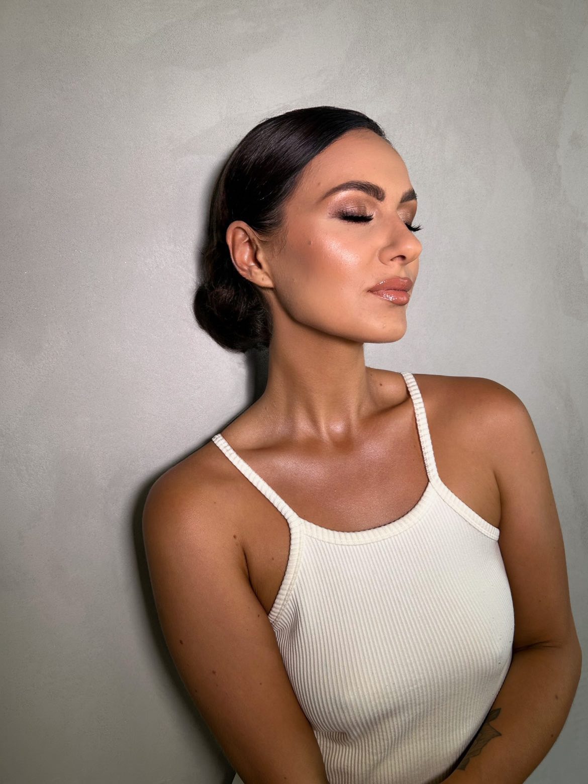 a woman with a white top and a white top