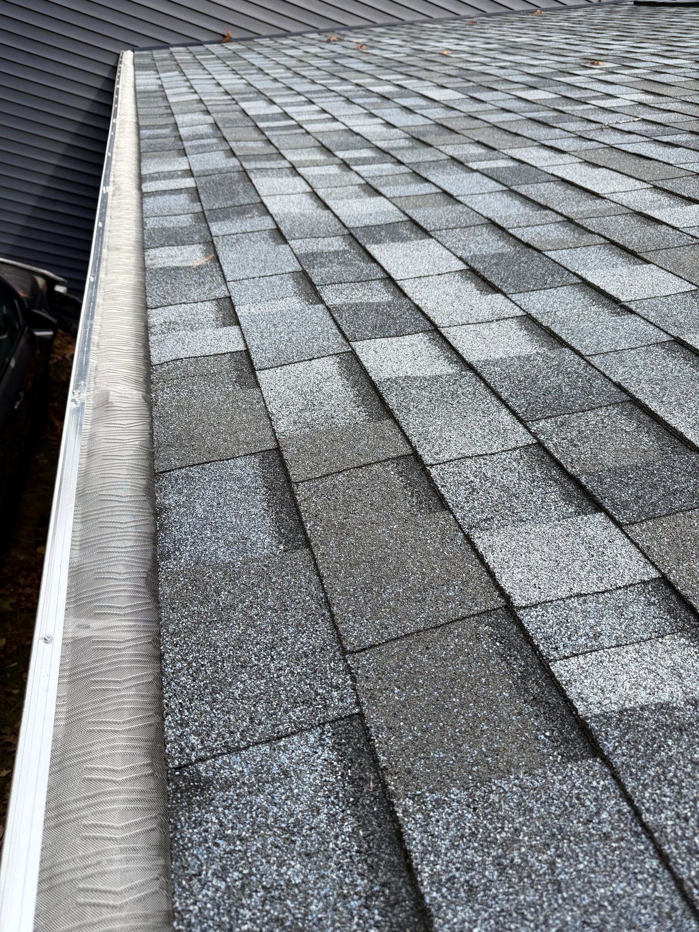 Roof contractor installed seamless gutters and leaf guards