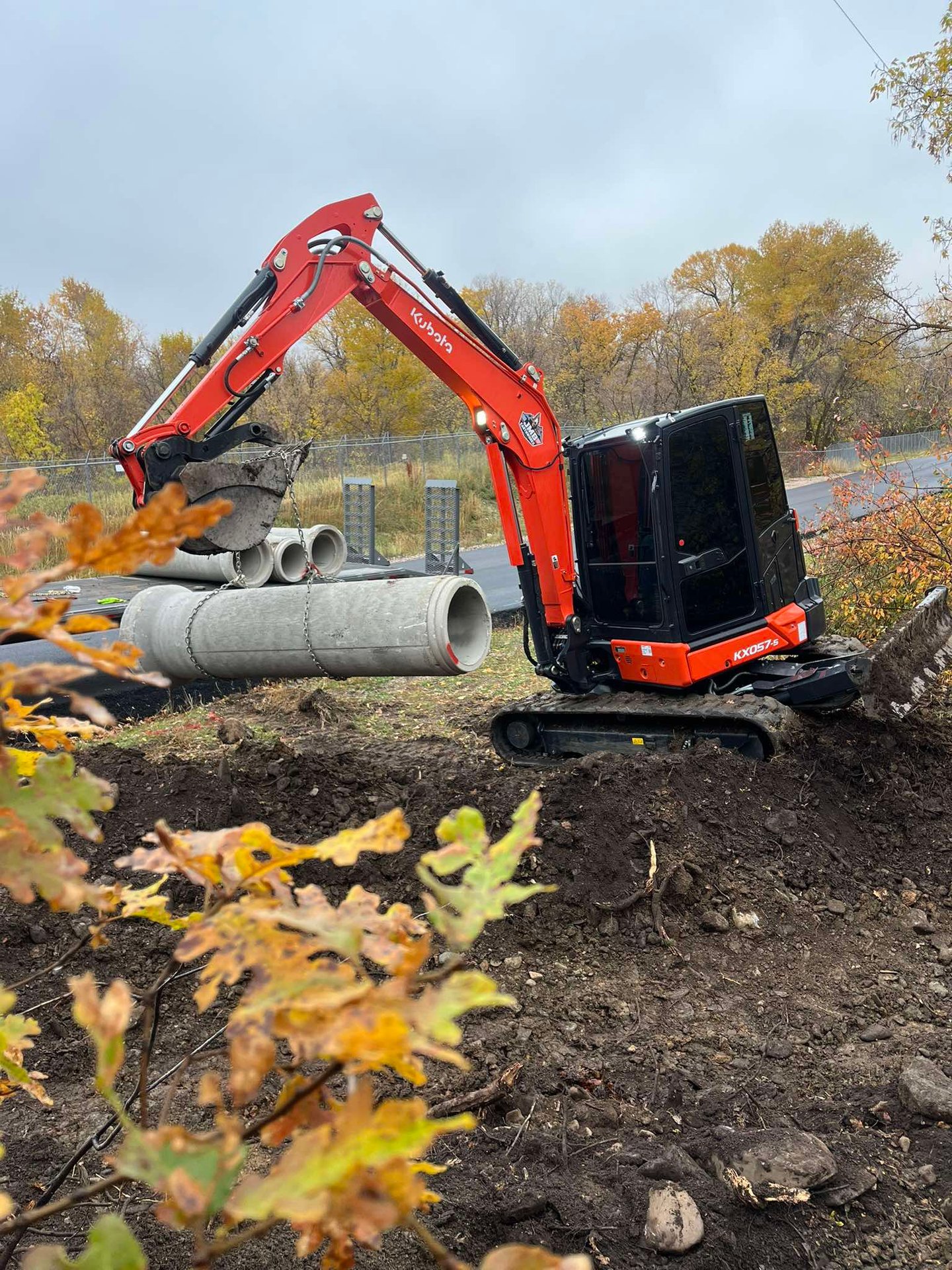 Kubota KX057-s excavating for drainage project