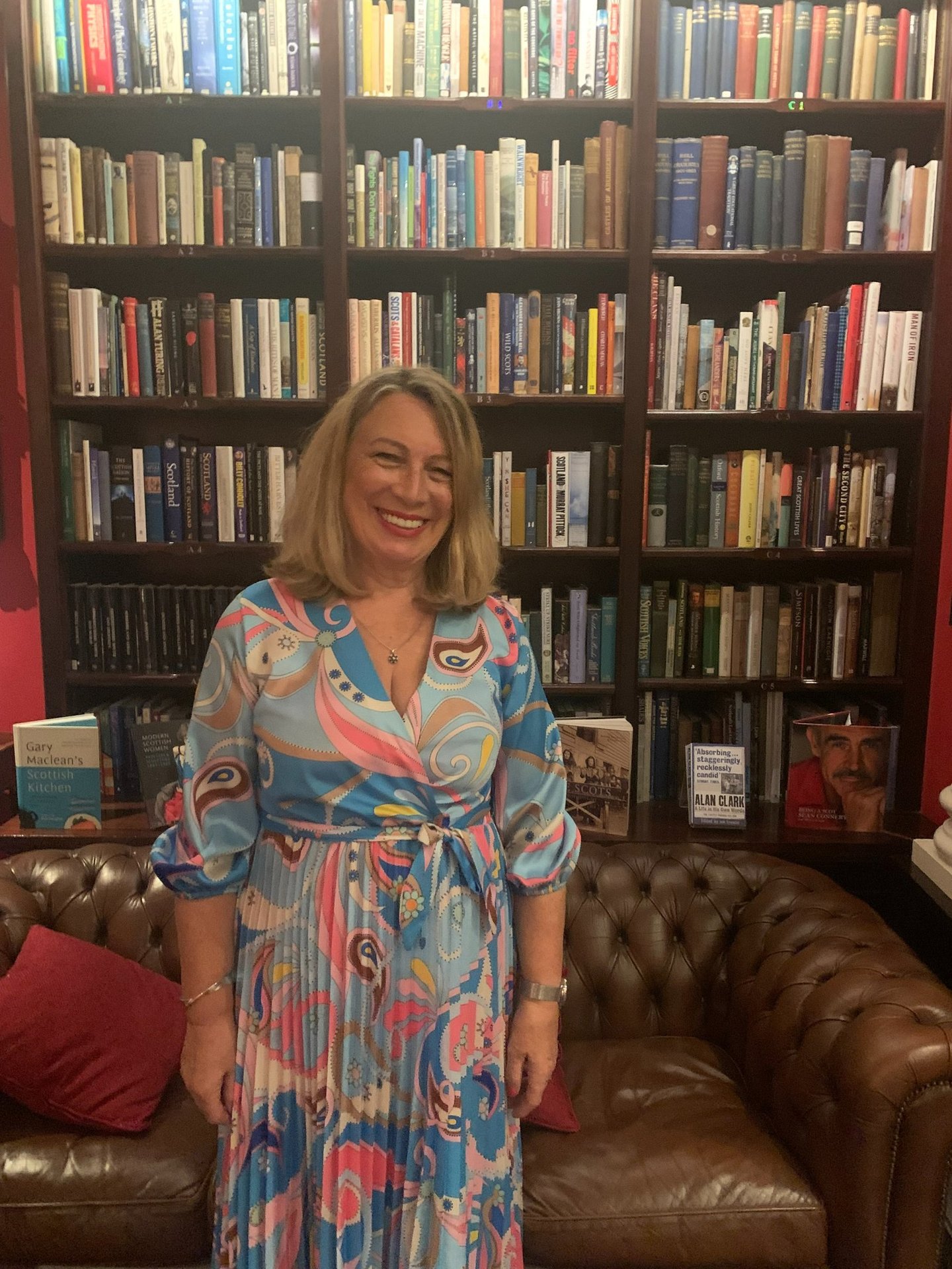 Photo of Averil Leimon in the library of the Caledonian Club