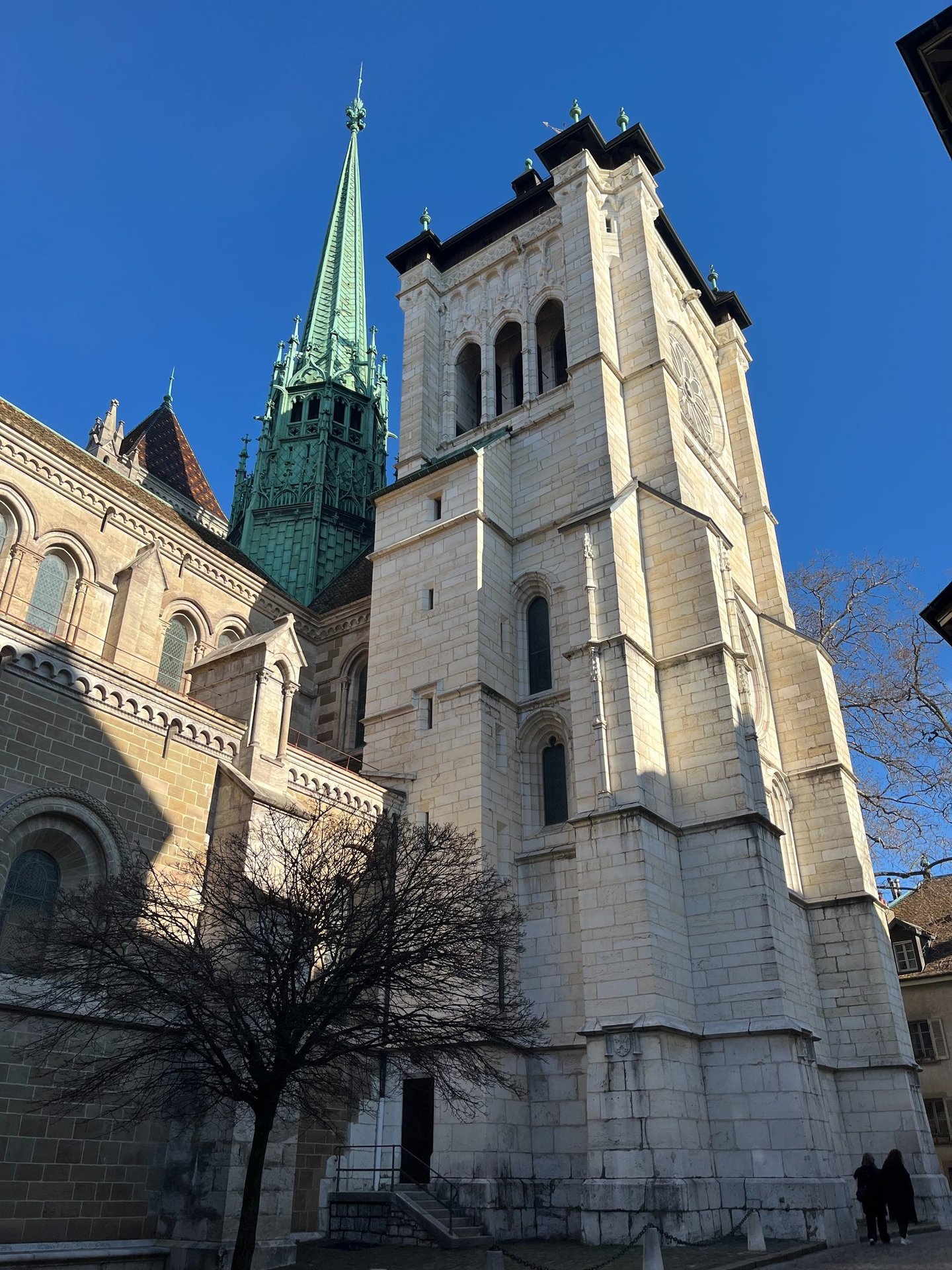A view looking up at the tower of St. Pierre Cathedral in Geneva, Switzerland