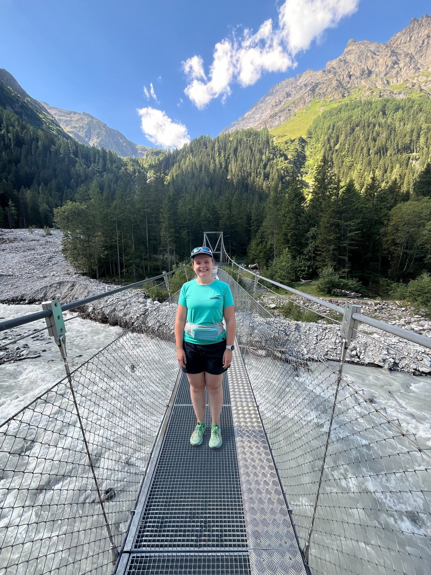 Corinne from Hidden Switzerland Travel crossing the Kander River in the Gasterntal