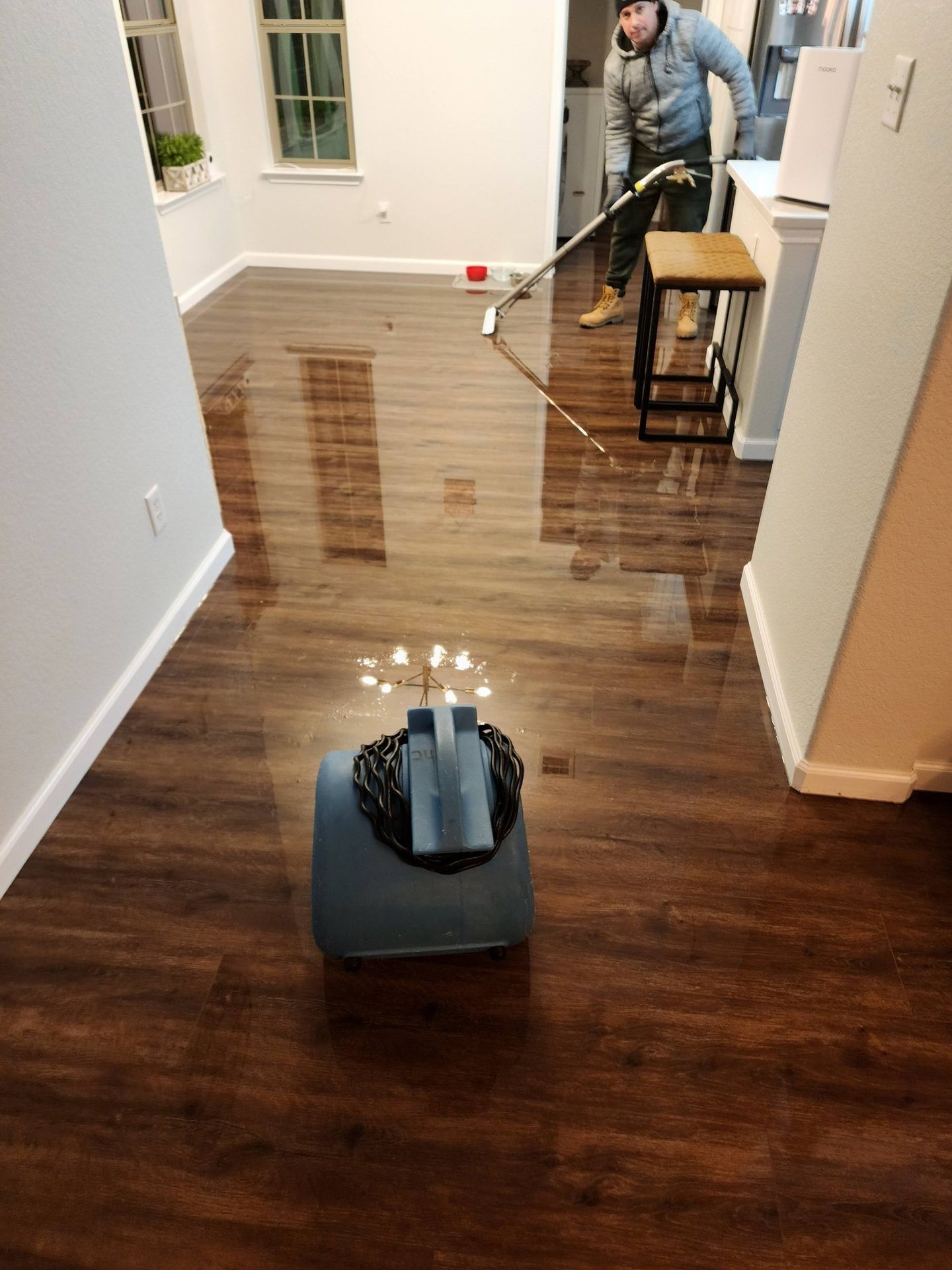 flooded-home-in-cedar-park-sucking-out-water-off-the-floor