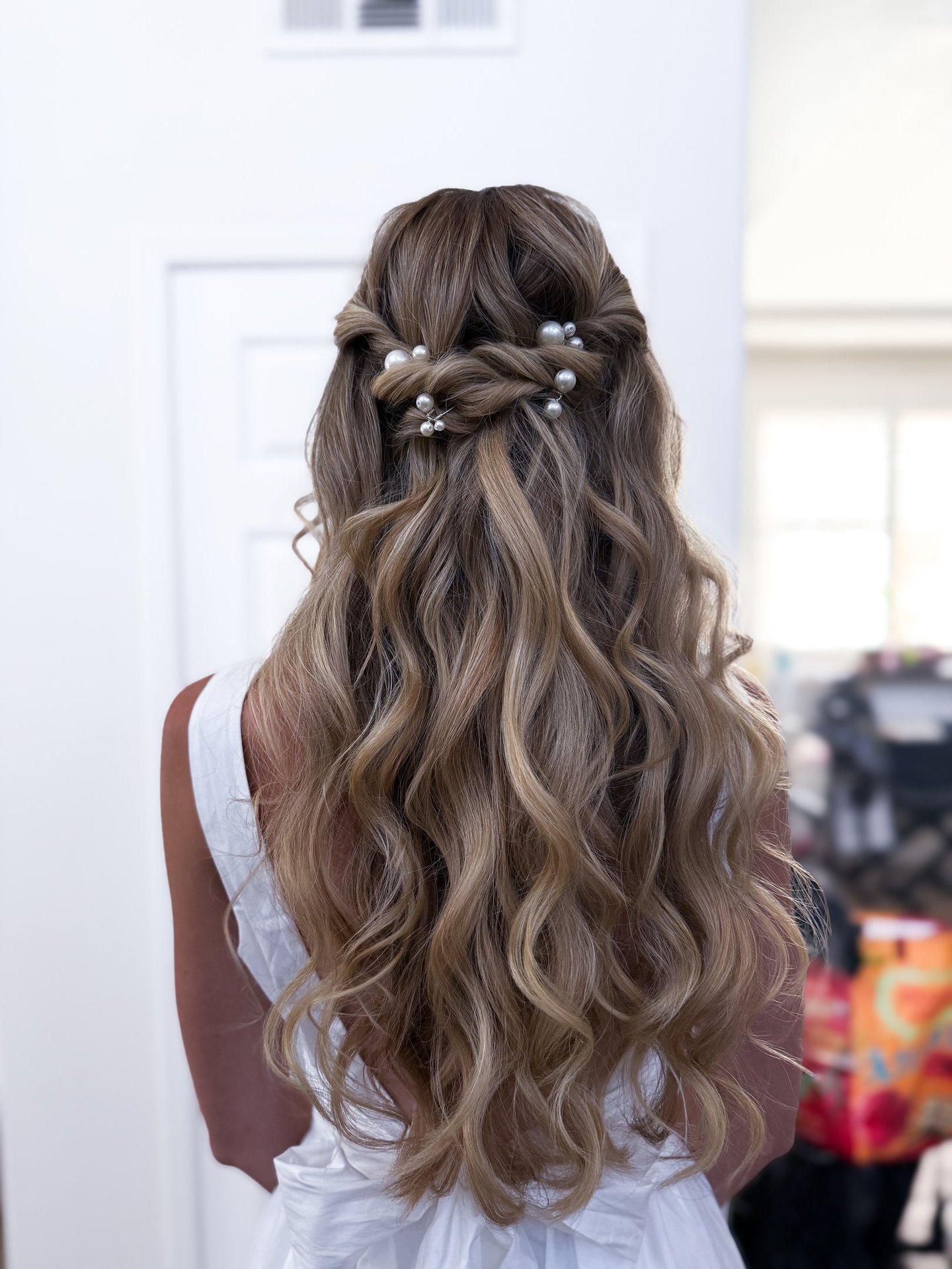 Modern romantic bridal hairstyle for Central California bride — effortless texture and volume
