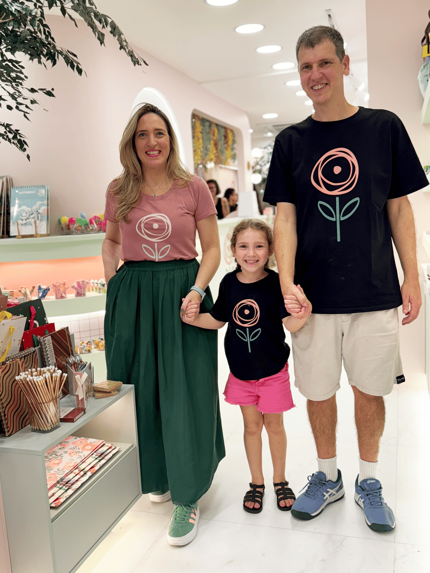 a man and woman holding hands and holding hands