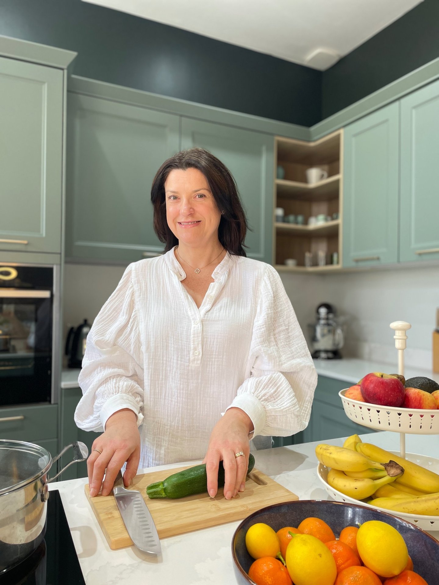 Louise Chamberlain in her kitchen. Nutrition coach, IBD support, gut health, menopause coach