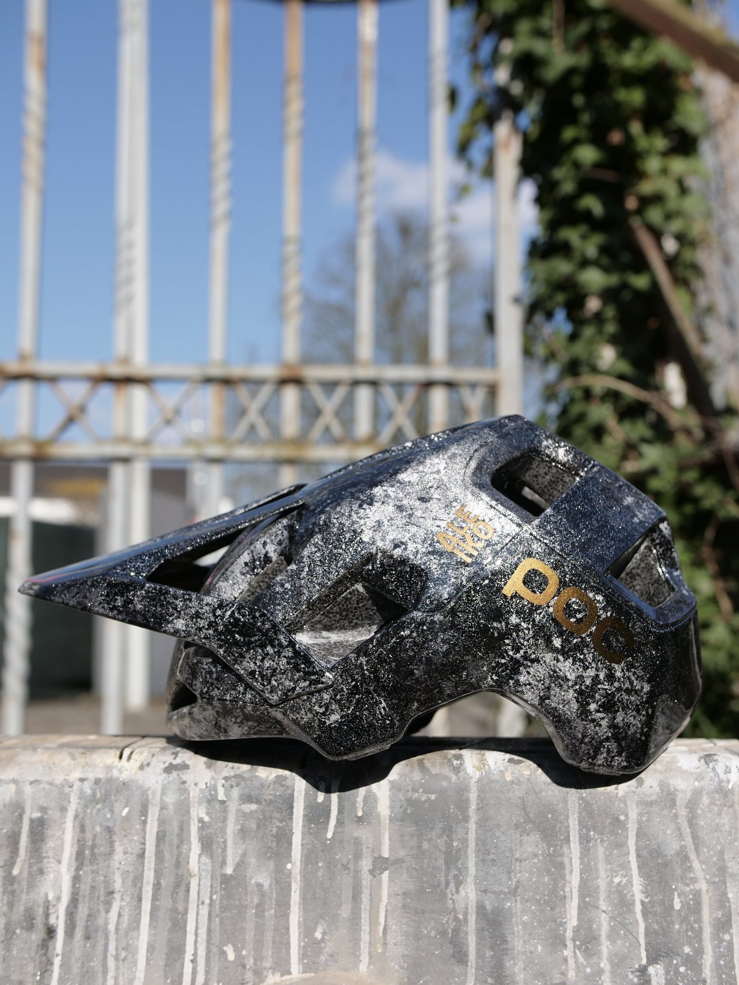 a MTB POC Helmet customized with marbling effect and gold