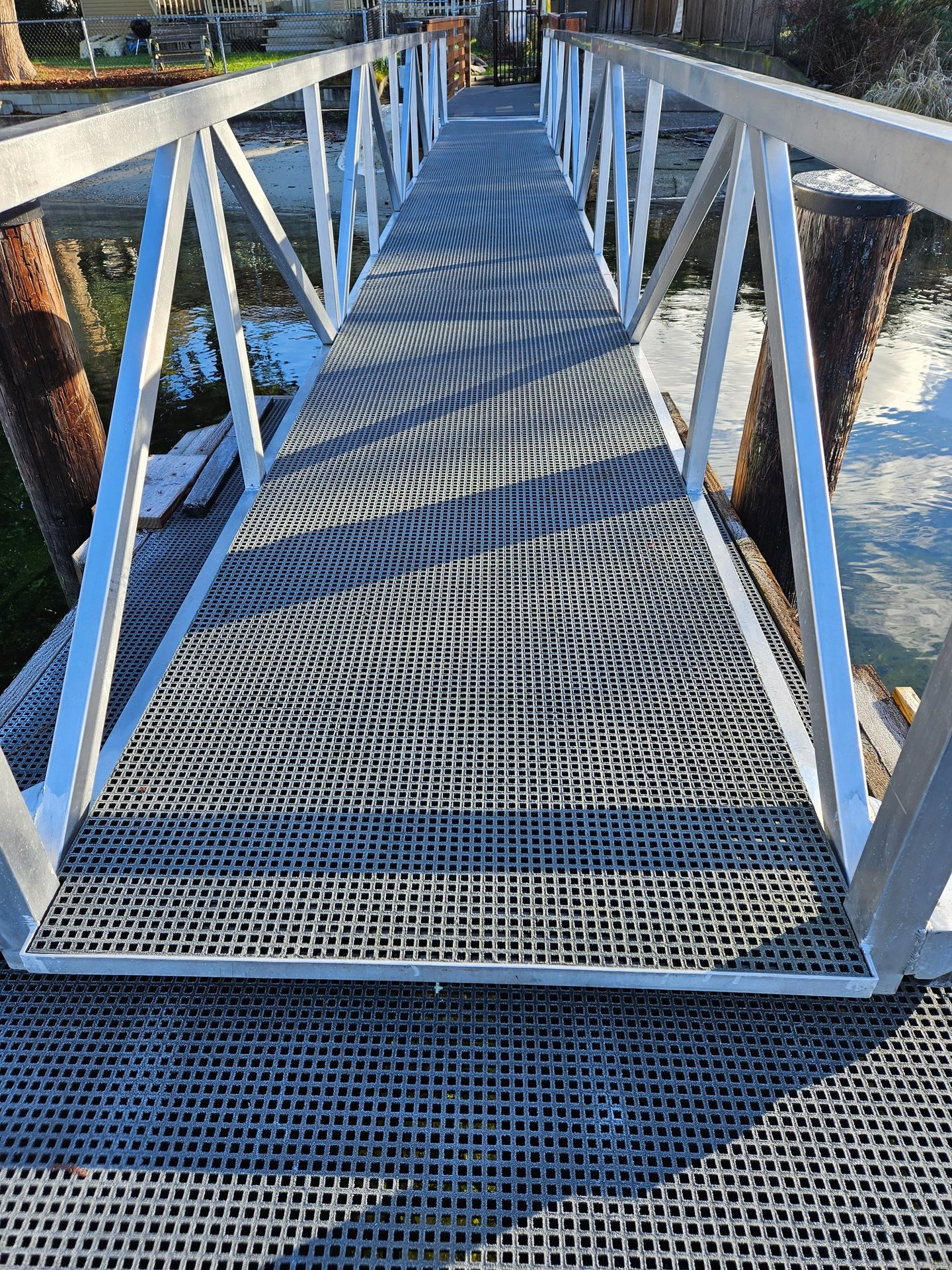 Commercial Marina Dock Gangway with FRP mesh installed.