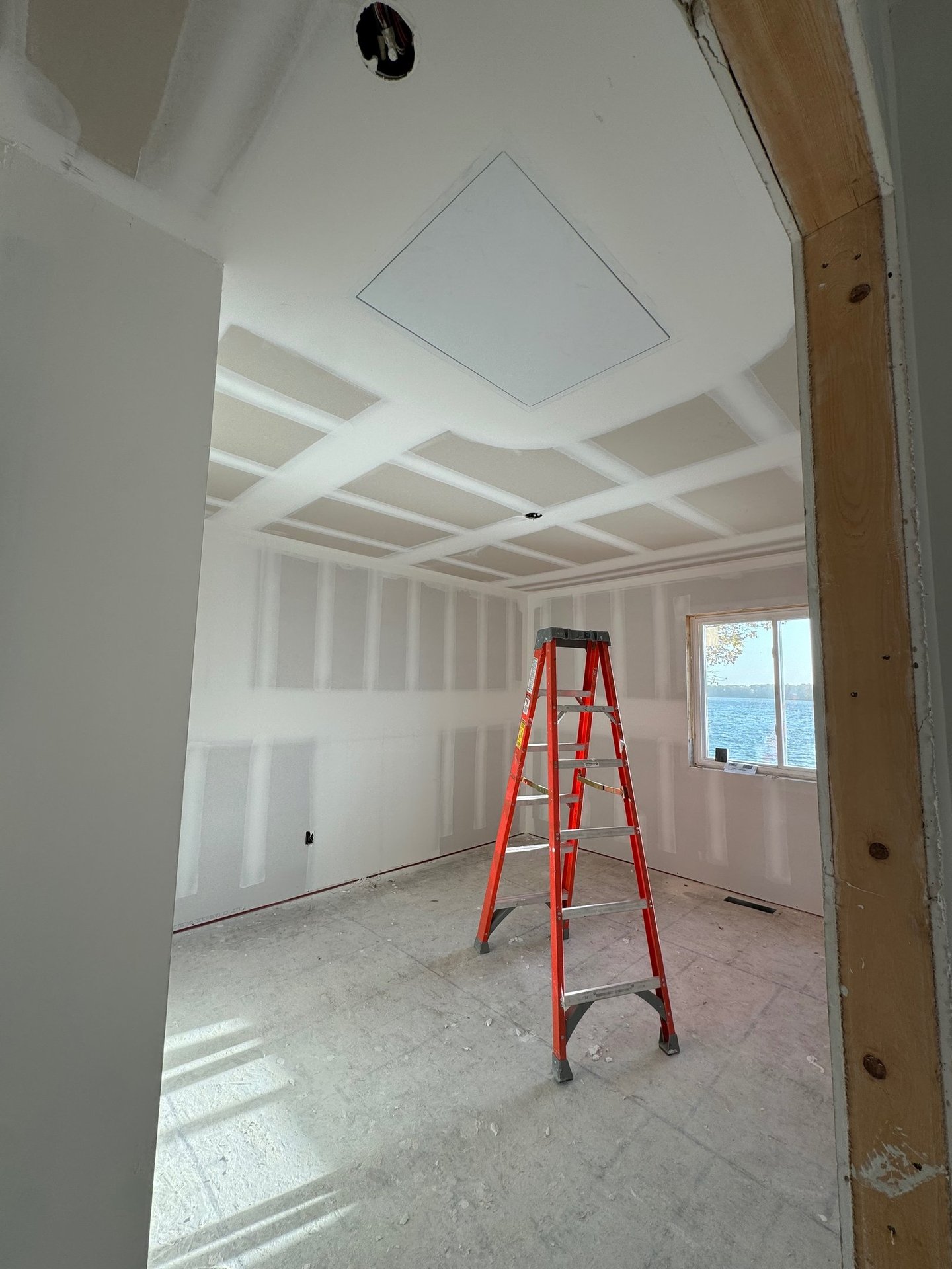 room with fresh drywall that is mudded and tapped in central mn