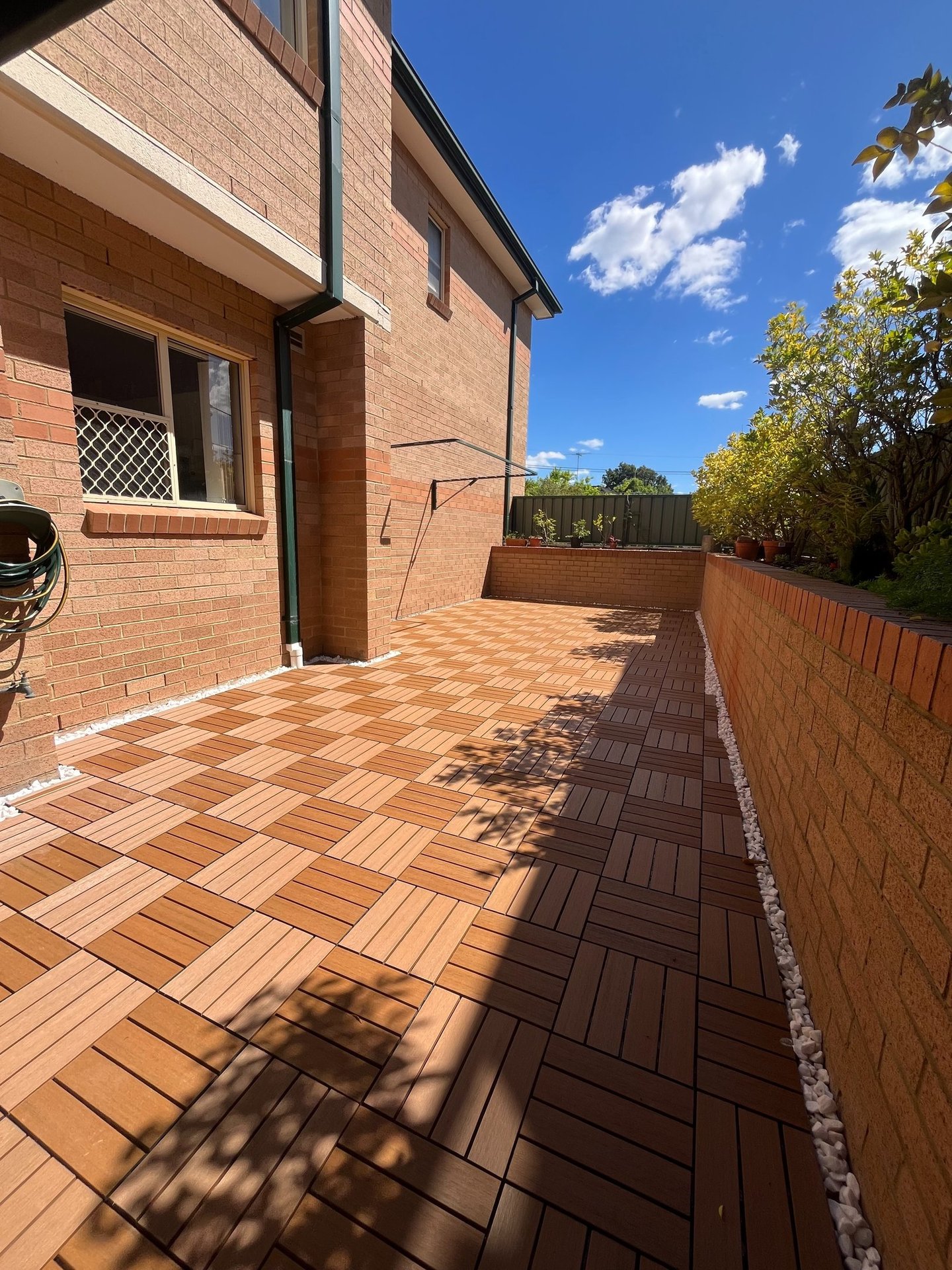 Residential outdoor renovation with interlocking decking tiles Maroubra