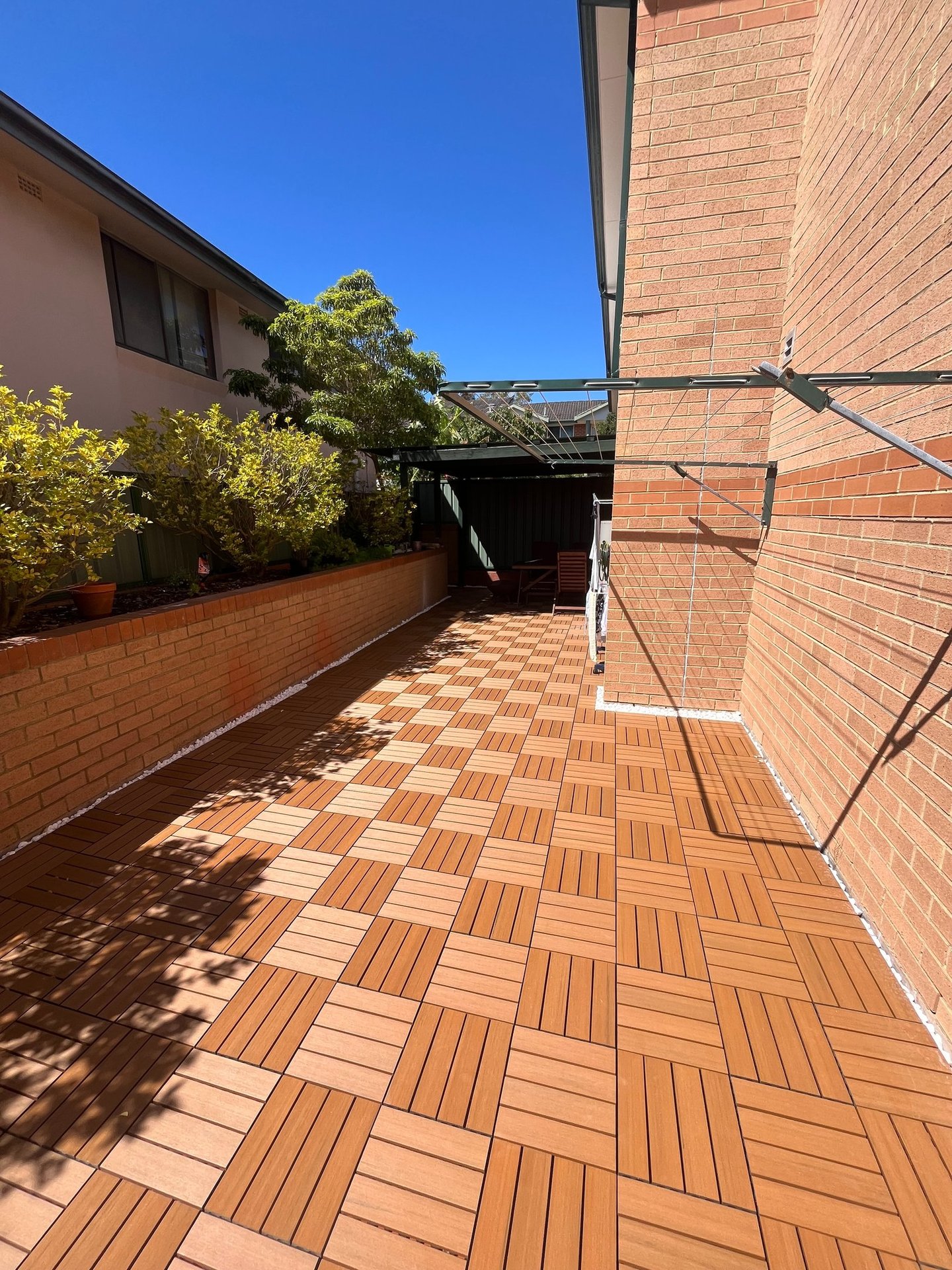 Before and after outdoor courtyard transformation for residential property