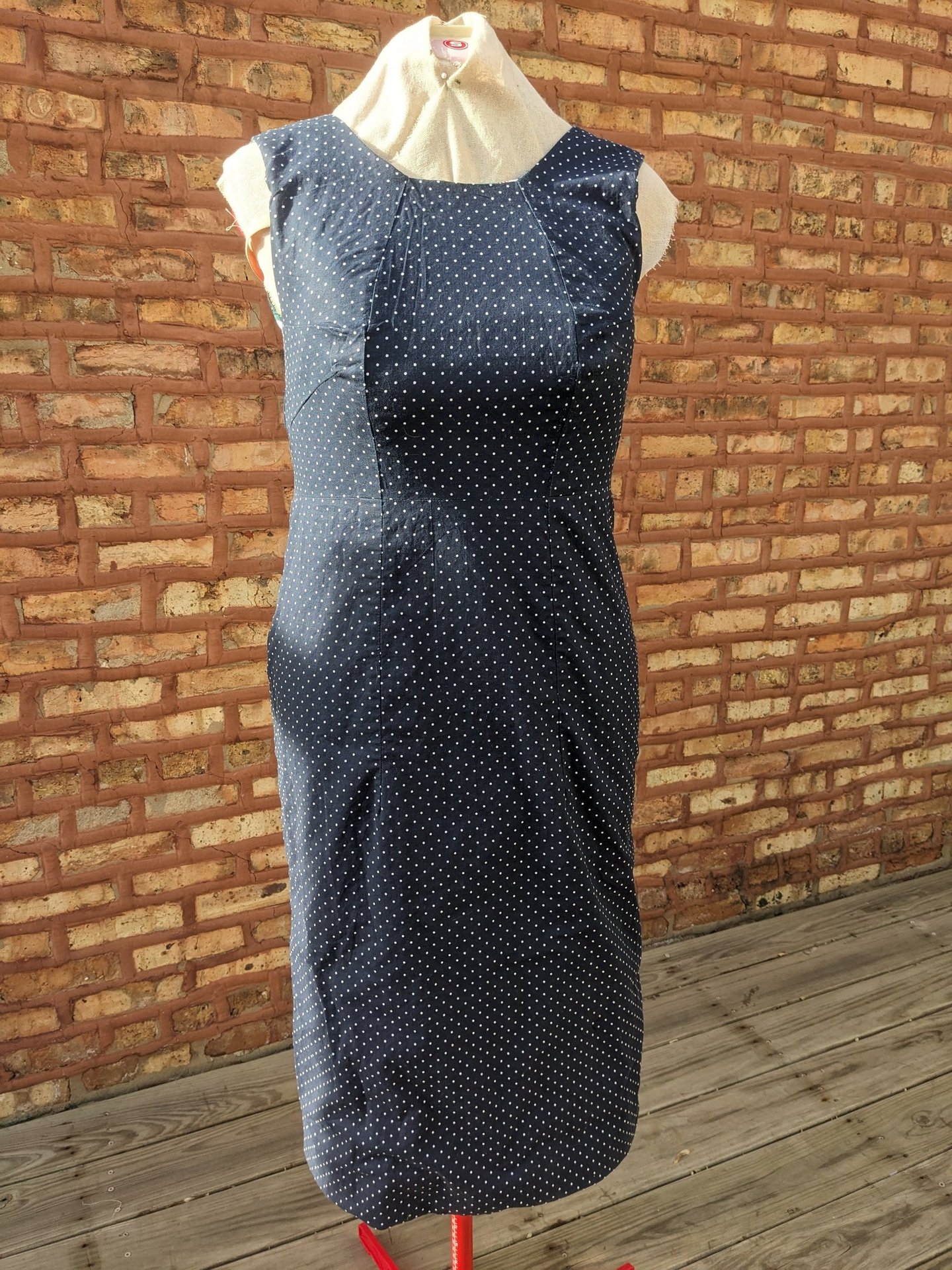 Navy and white polka dot sheath dress