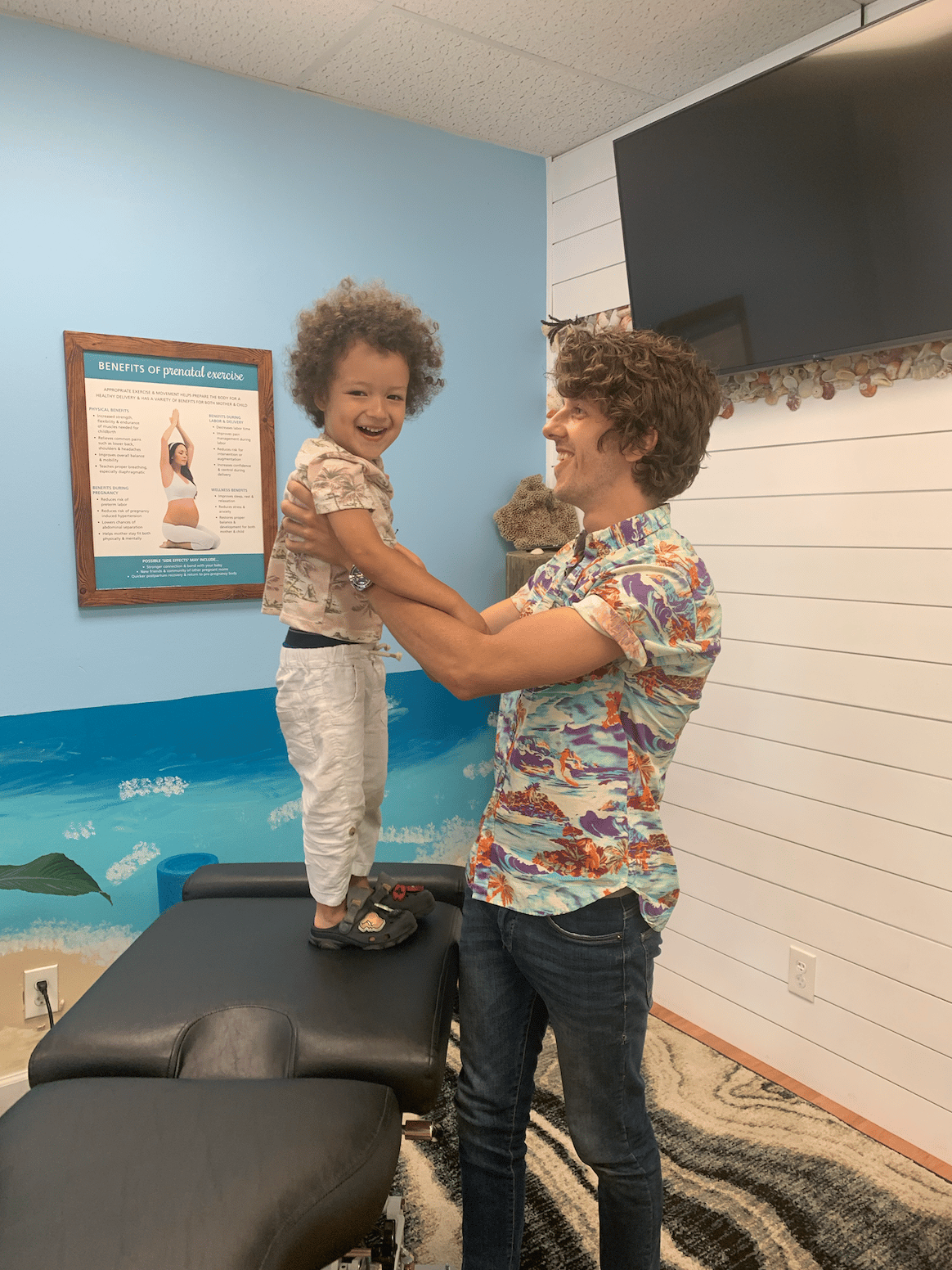 Child relaxed and smiling during pediatric chiropractic visit in Franklin Tn