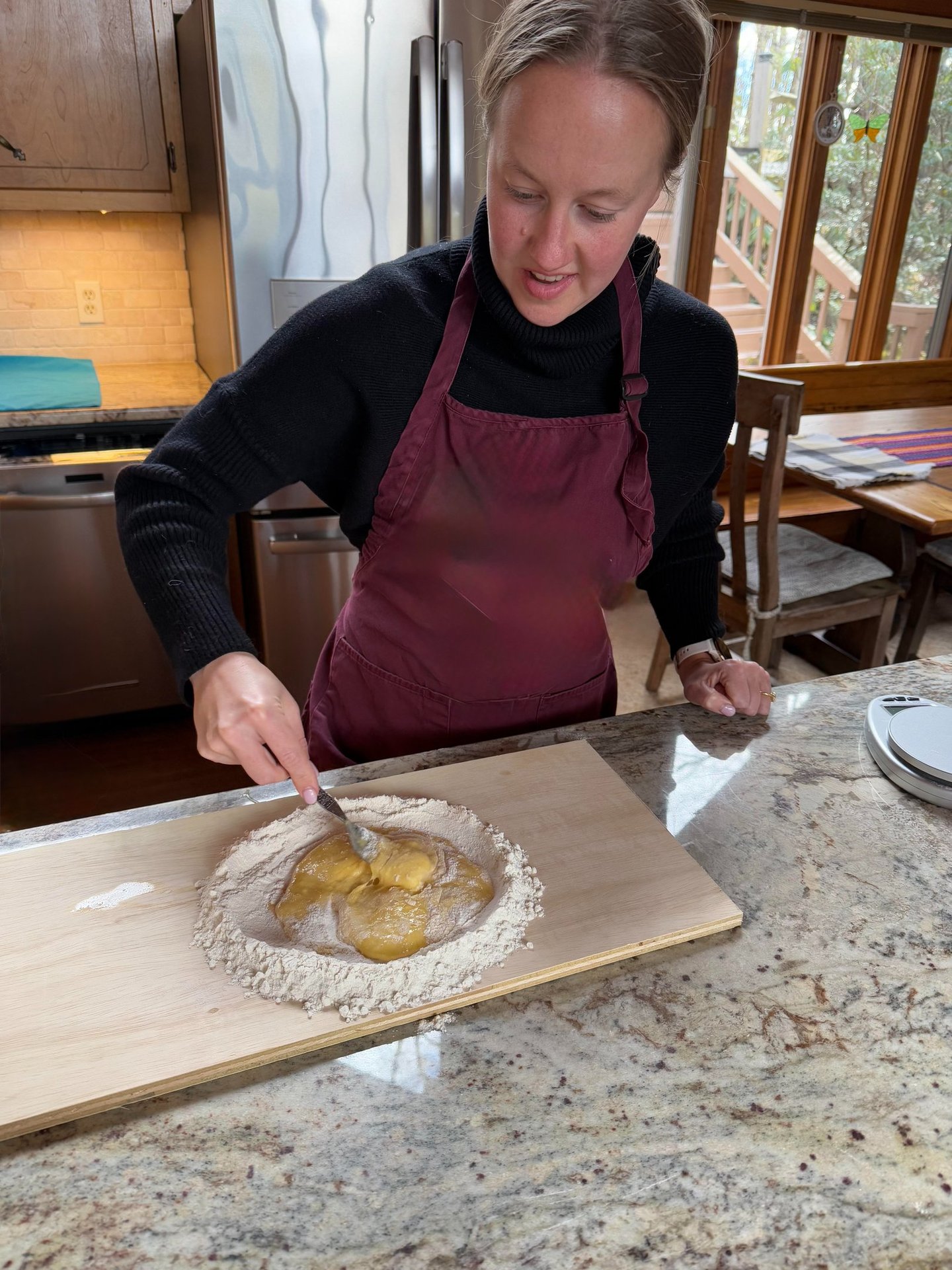 Class participant making pasta dough