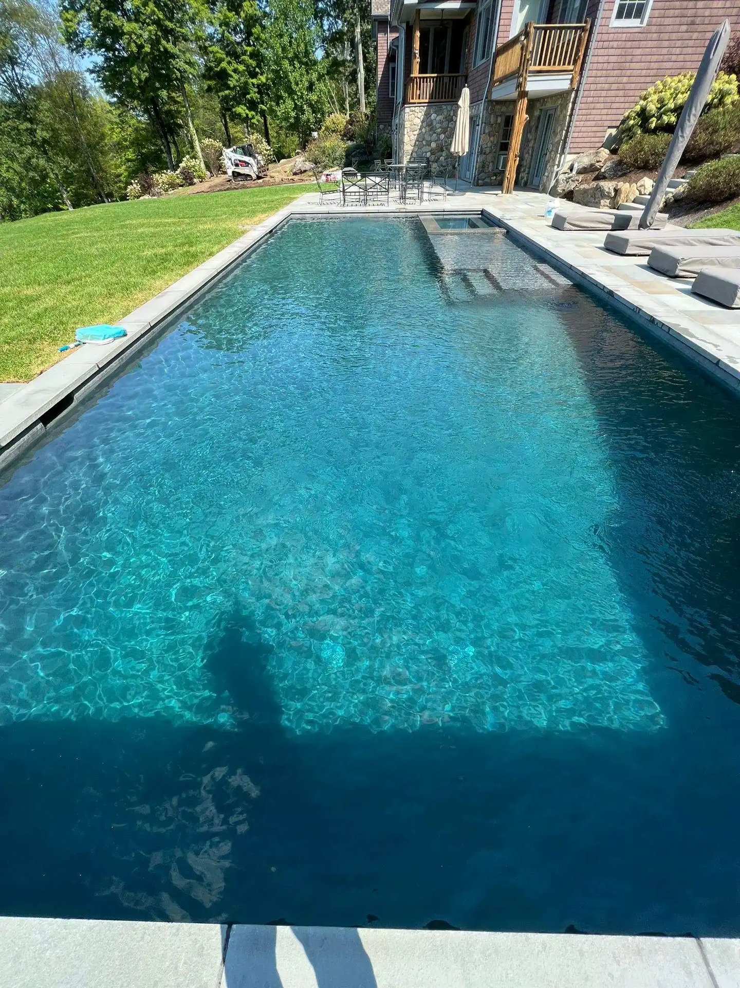Reliable swimming pool maintenance for homeowners in Connecticut, providing a spotless swimming