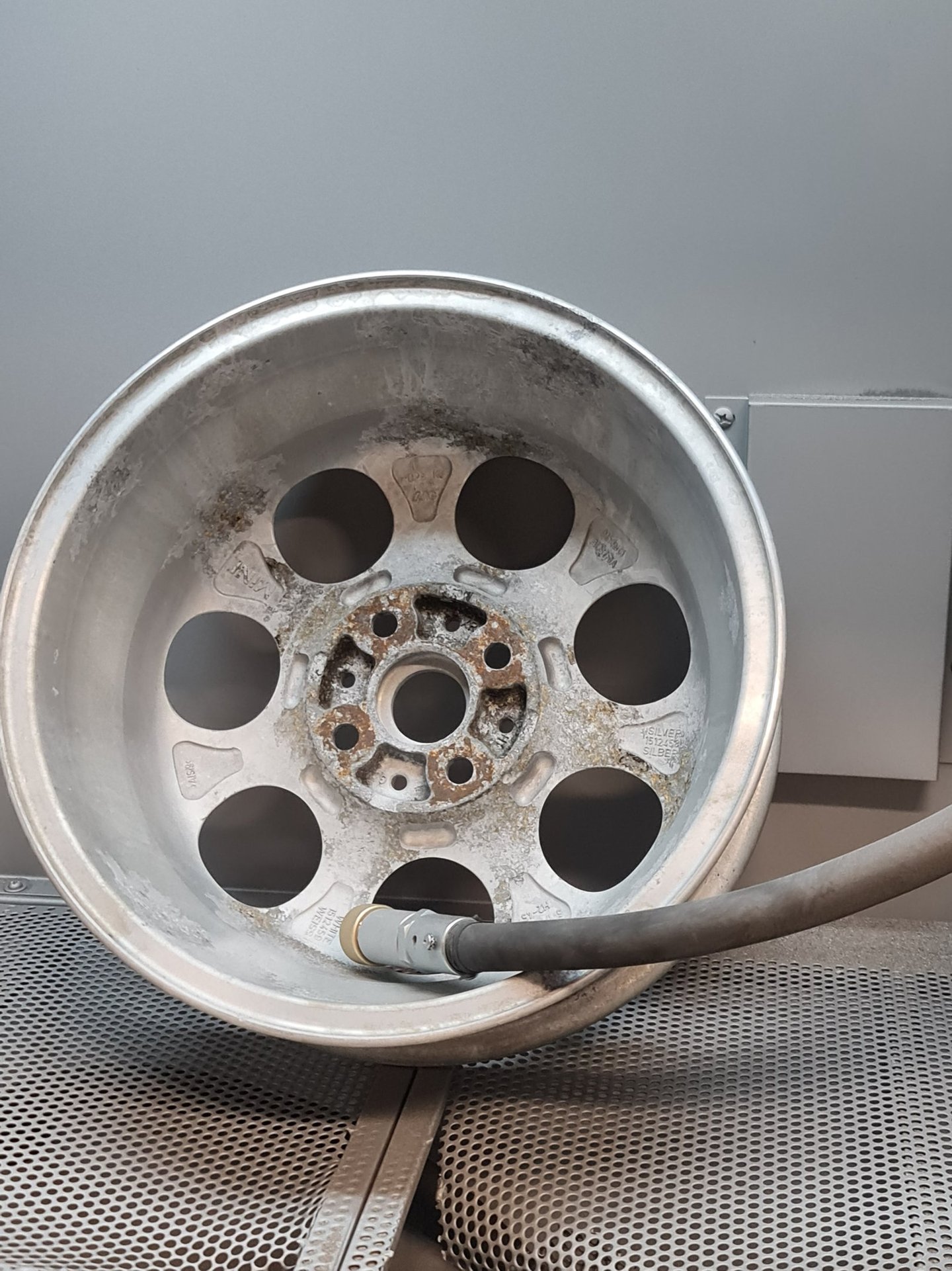 a tire with a hose attached to a tire