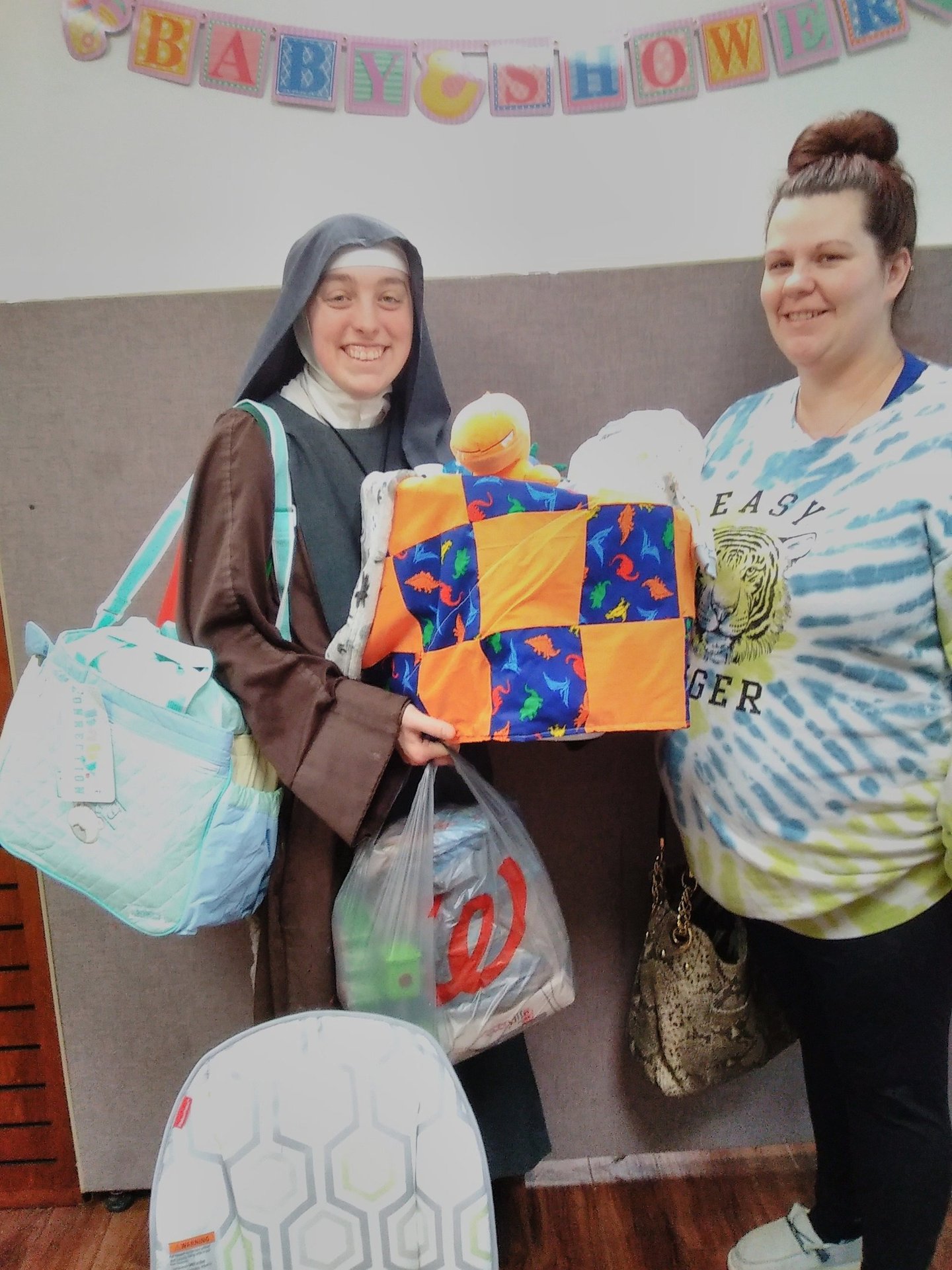 A mom receiving free help from the Rose Garden
