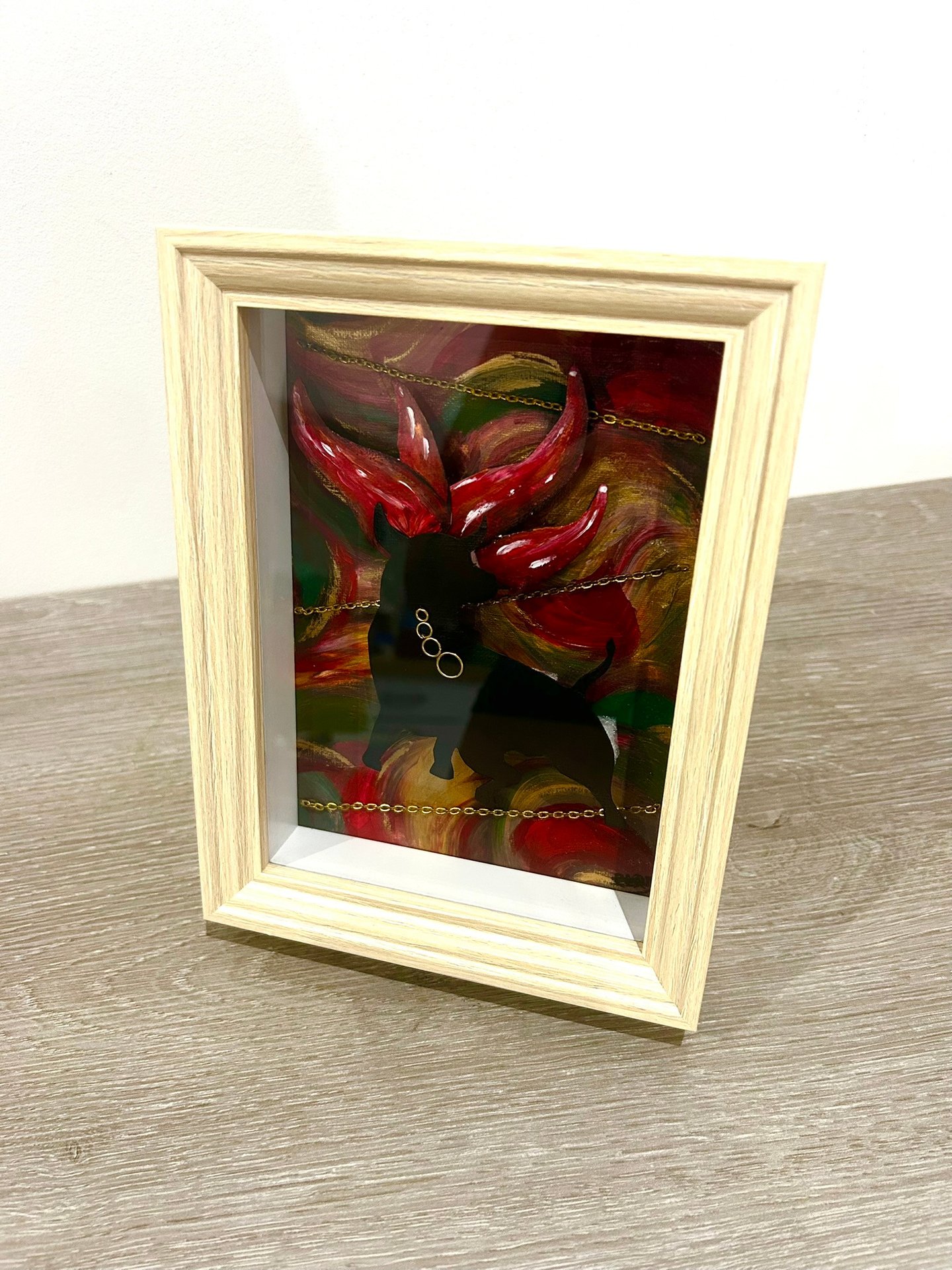 Ilona Paris painting, a picture of a picture of a bull with fire