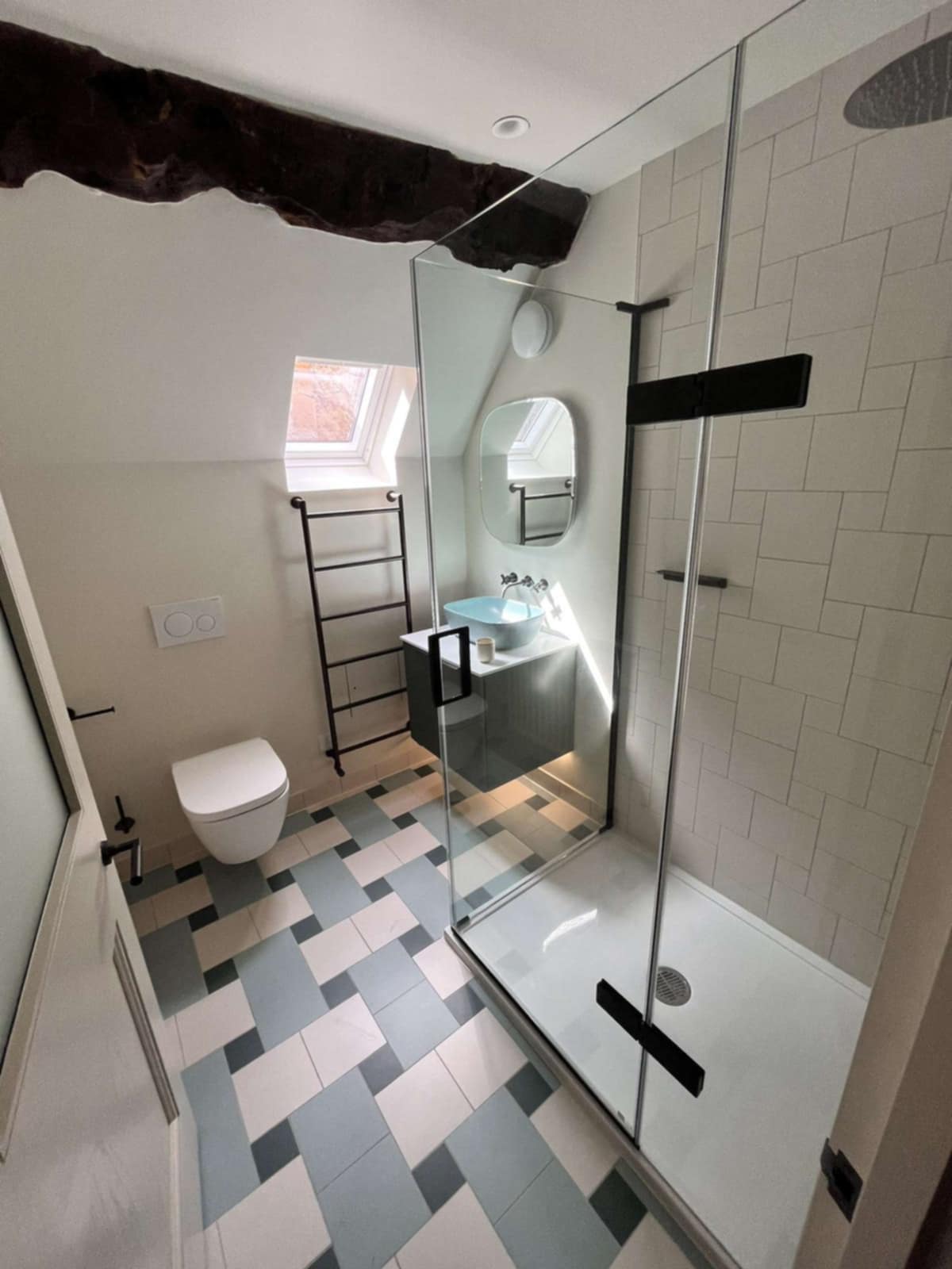 Bathroom with modern bathtub and vanity unit installed by PBP Services in Evesham