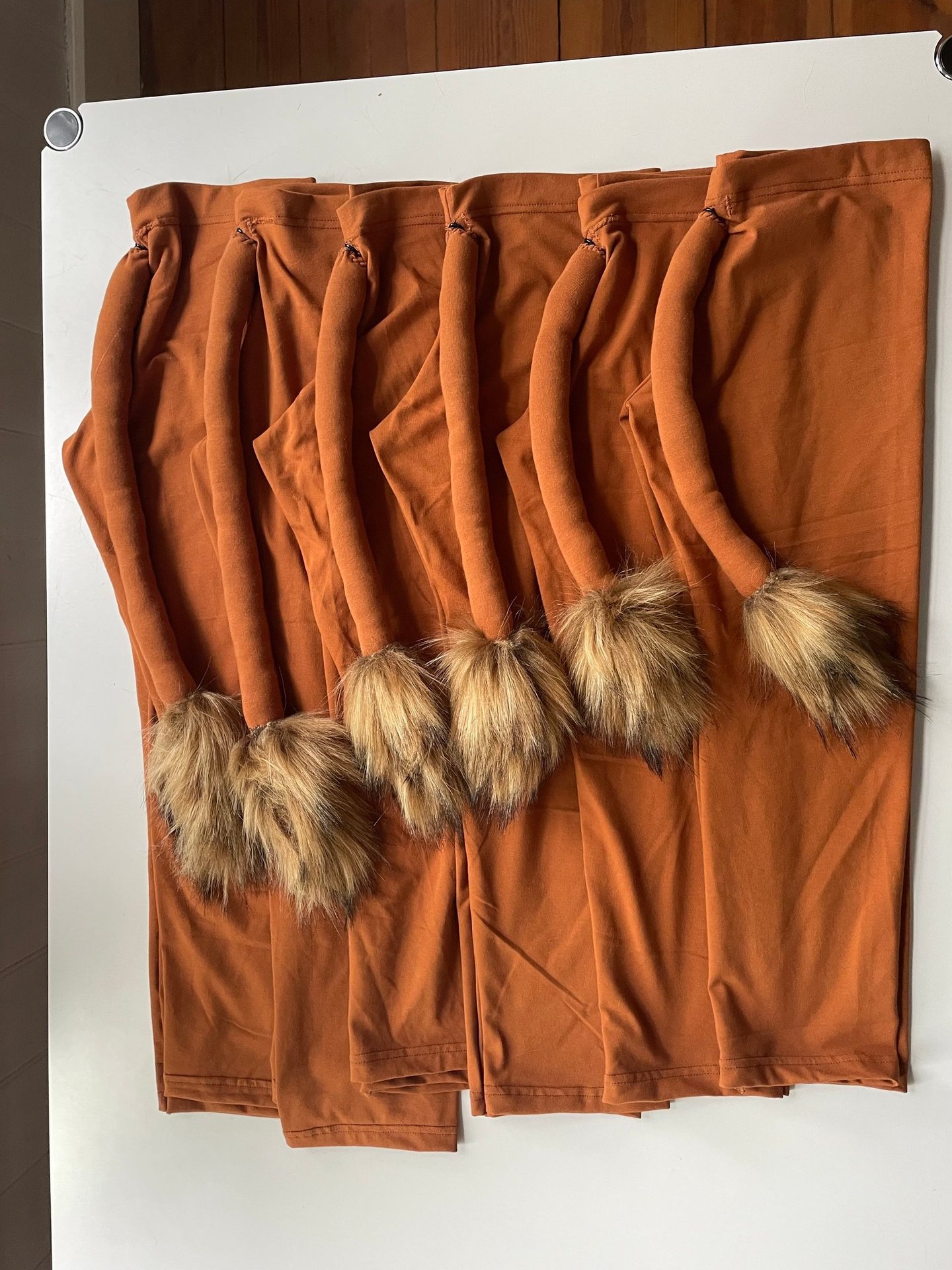 Handmade lion costume leggings with attached tails and faux fur tips