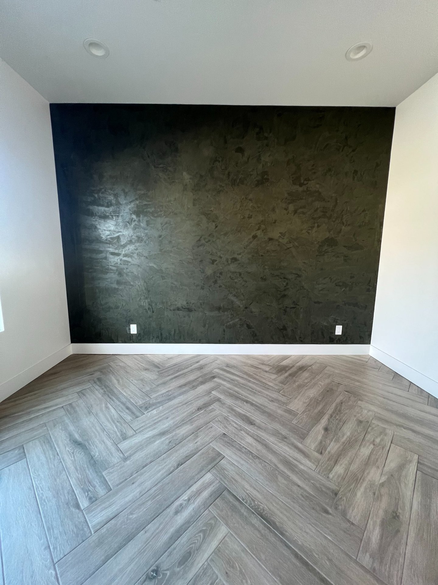 Modern Roman clay feature wall with a soft, matte texture, bringing an earthy and refined look