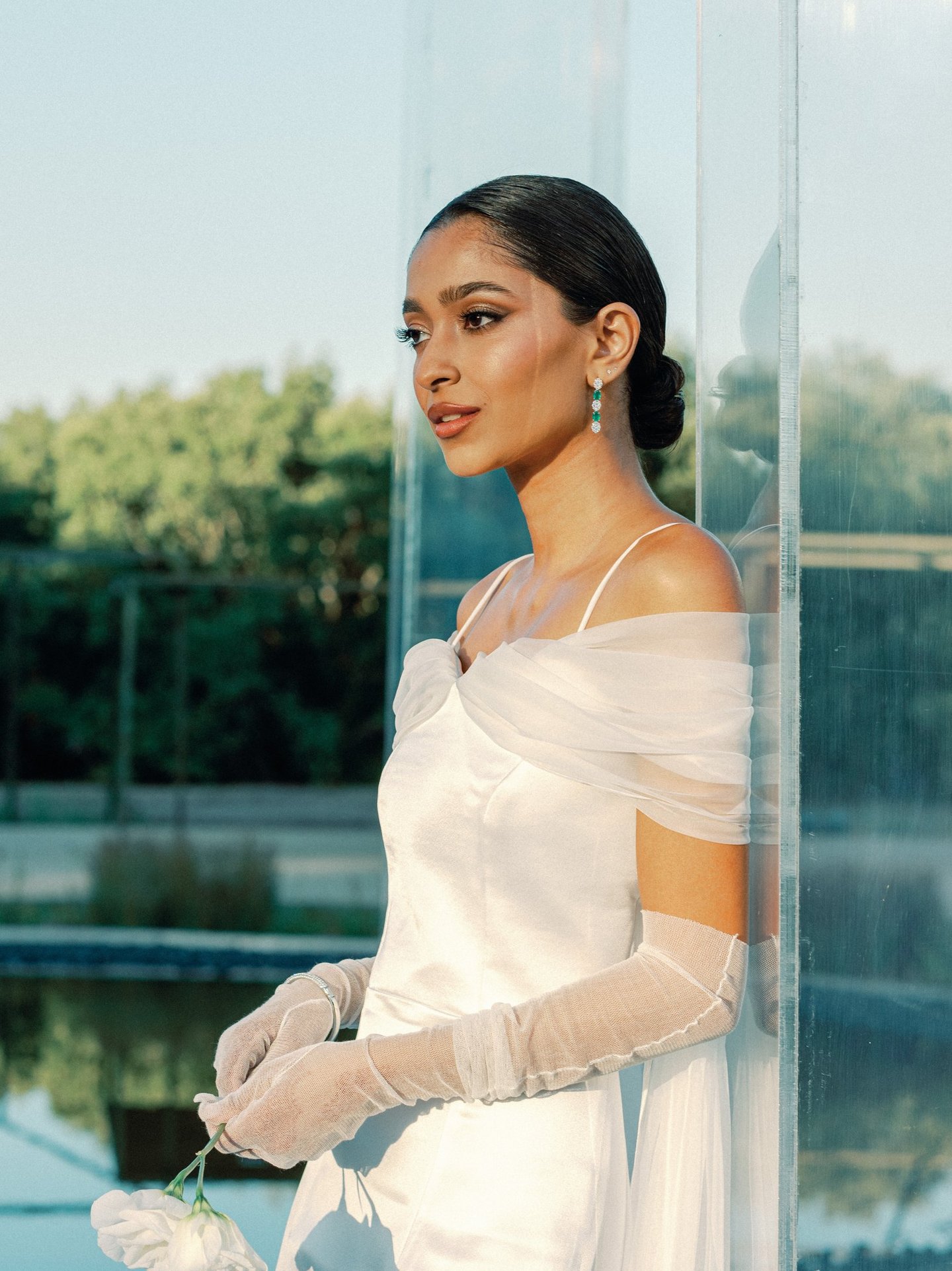 Minimalist bride Zahra Omarji wearing sleek low bun