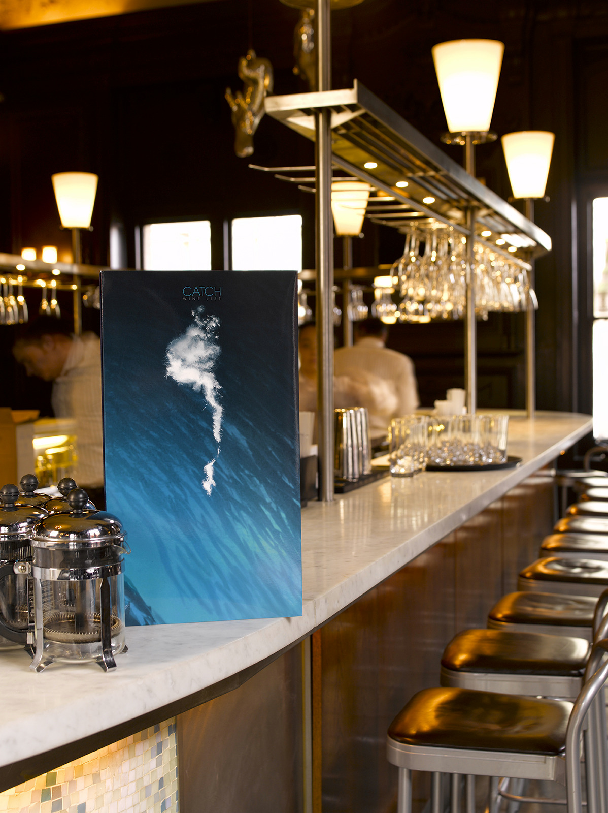 blue menu on marble surface in bar