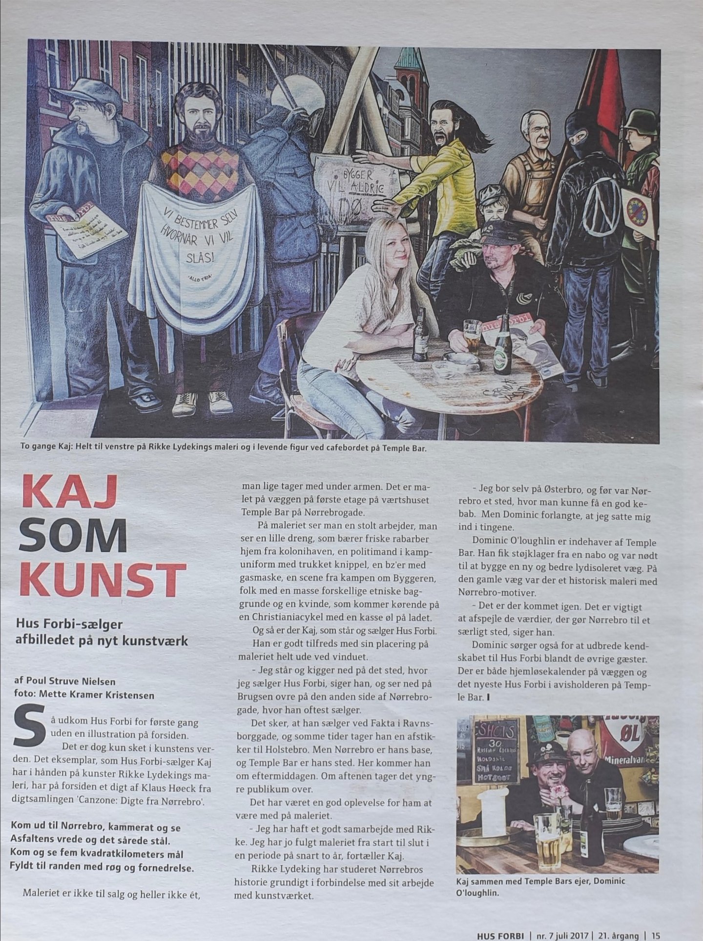 A colorful painting of street protesters and locals in Nørrebro displayed in a Danish newspaper article about Kaj.
