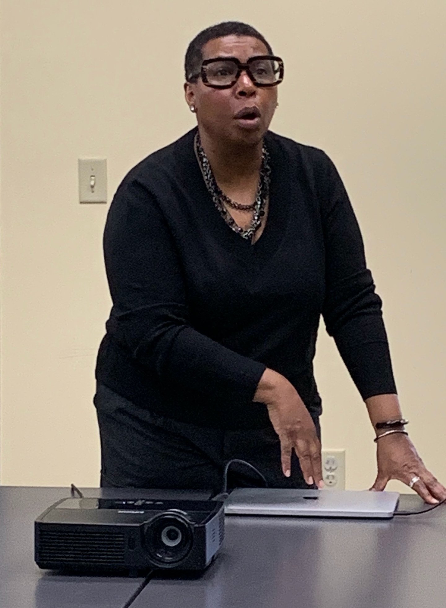 woman presenting a slideshow