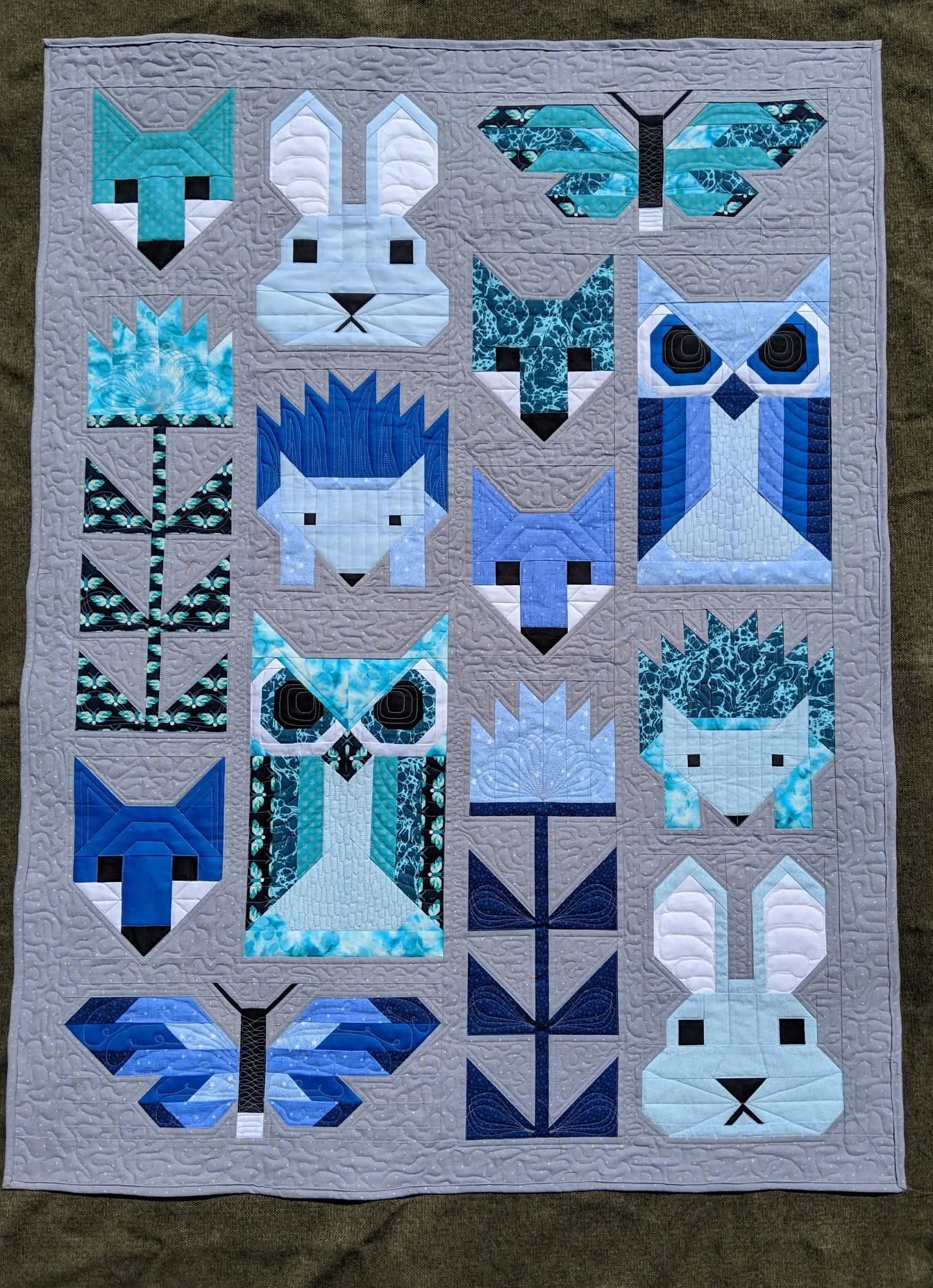 Elizabeth Hartman Fancy Forest quilt with colorful forest animals