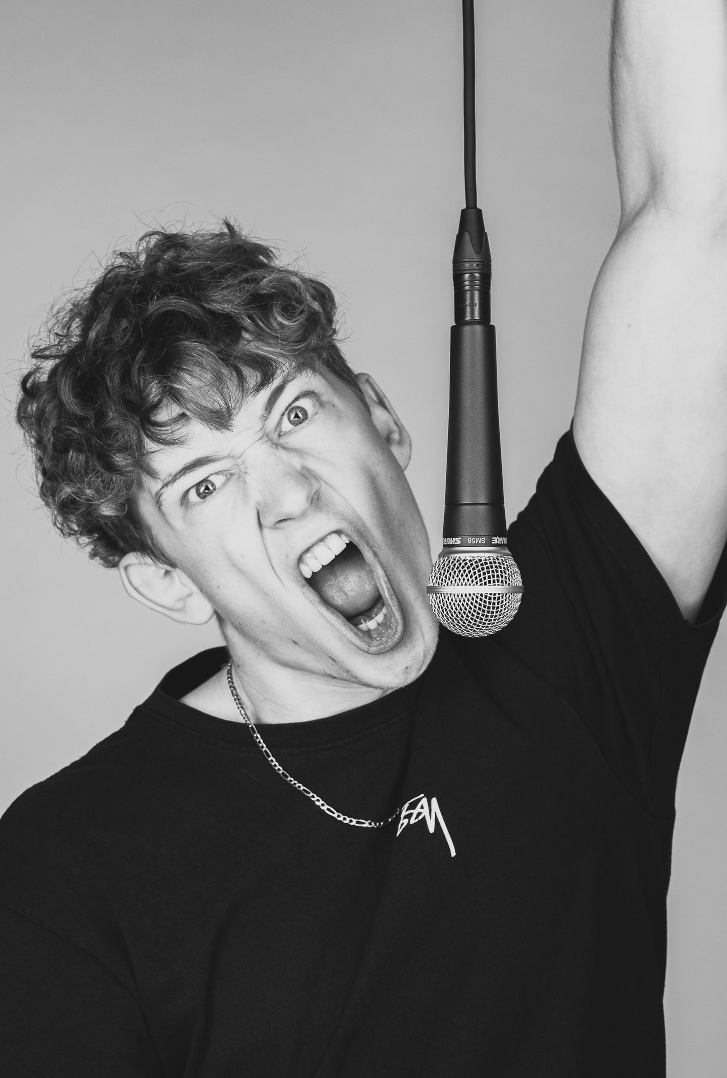 portrait of a man with a microphone and a microphone