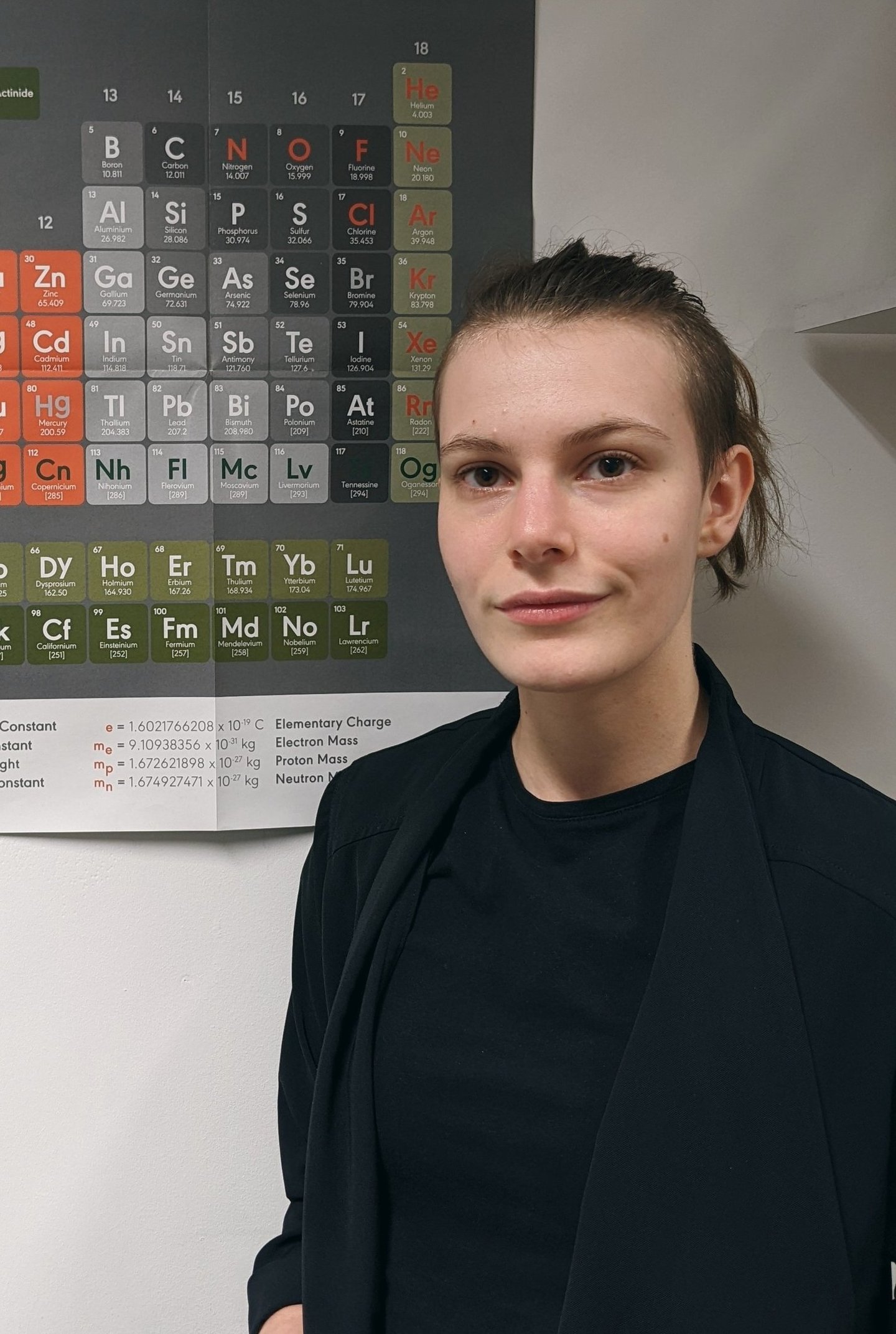 a woman in a black jacket and black jacket