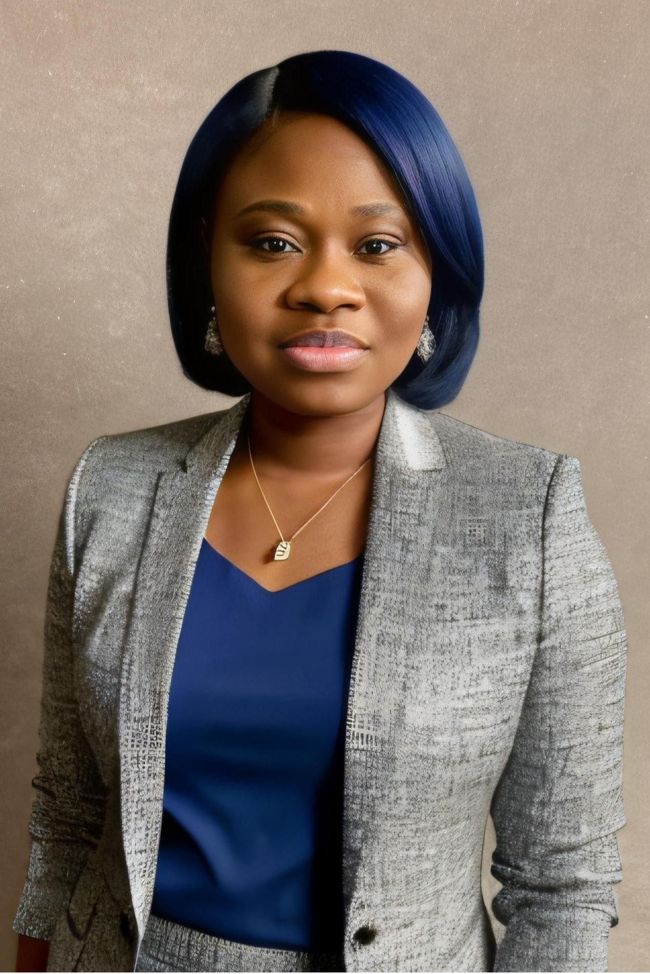 Lavette Minn, Certified AI in Healthcare Consultant and Brand Manager, wearing a gray blazer