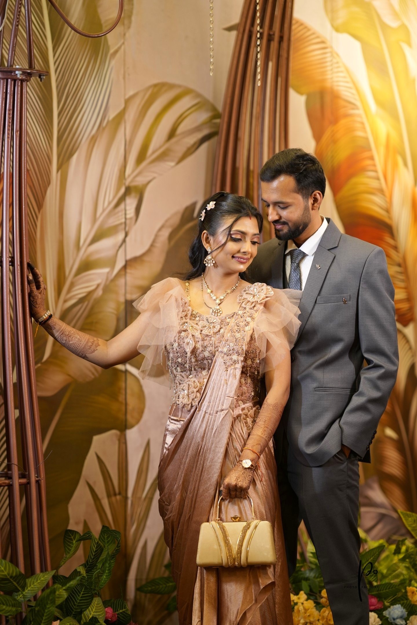 Vadodara wedding couple at reception - bride's makeup by best bridal makeup artist RD Bridal Makeup 