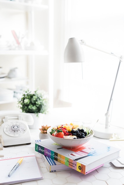 a bowl of fruit salad on a table