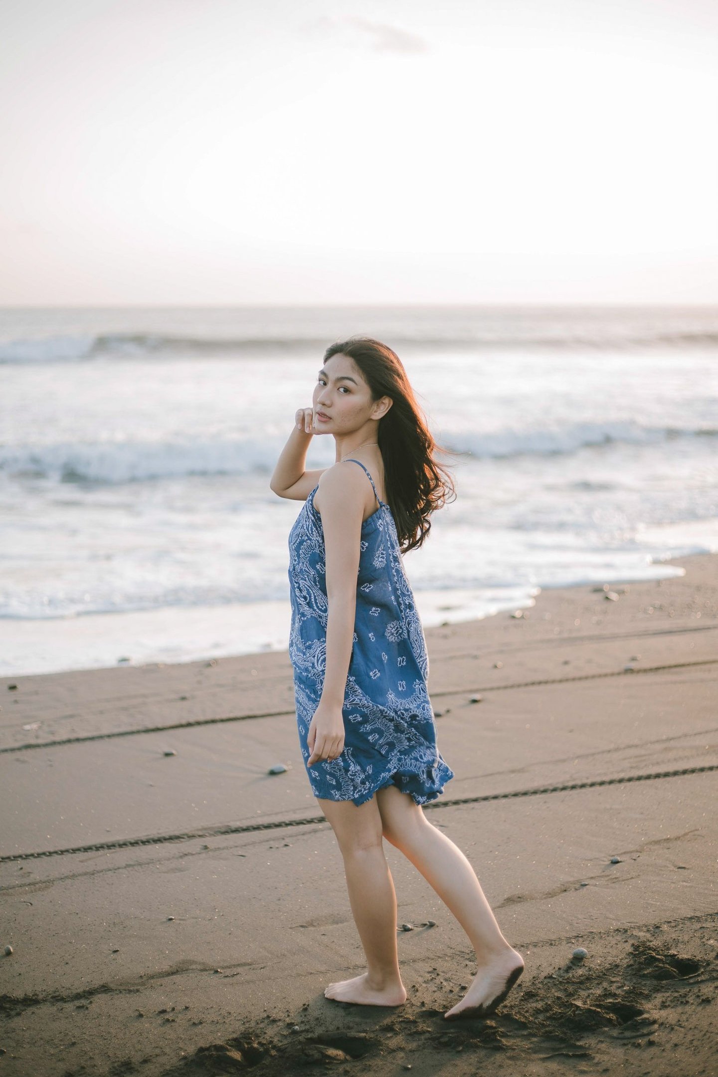 Artistic standing portrait at Pantai Nyanyi beach Tabanan Bali
