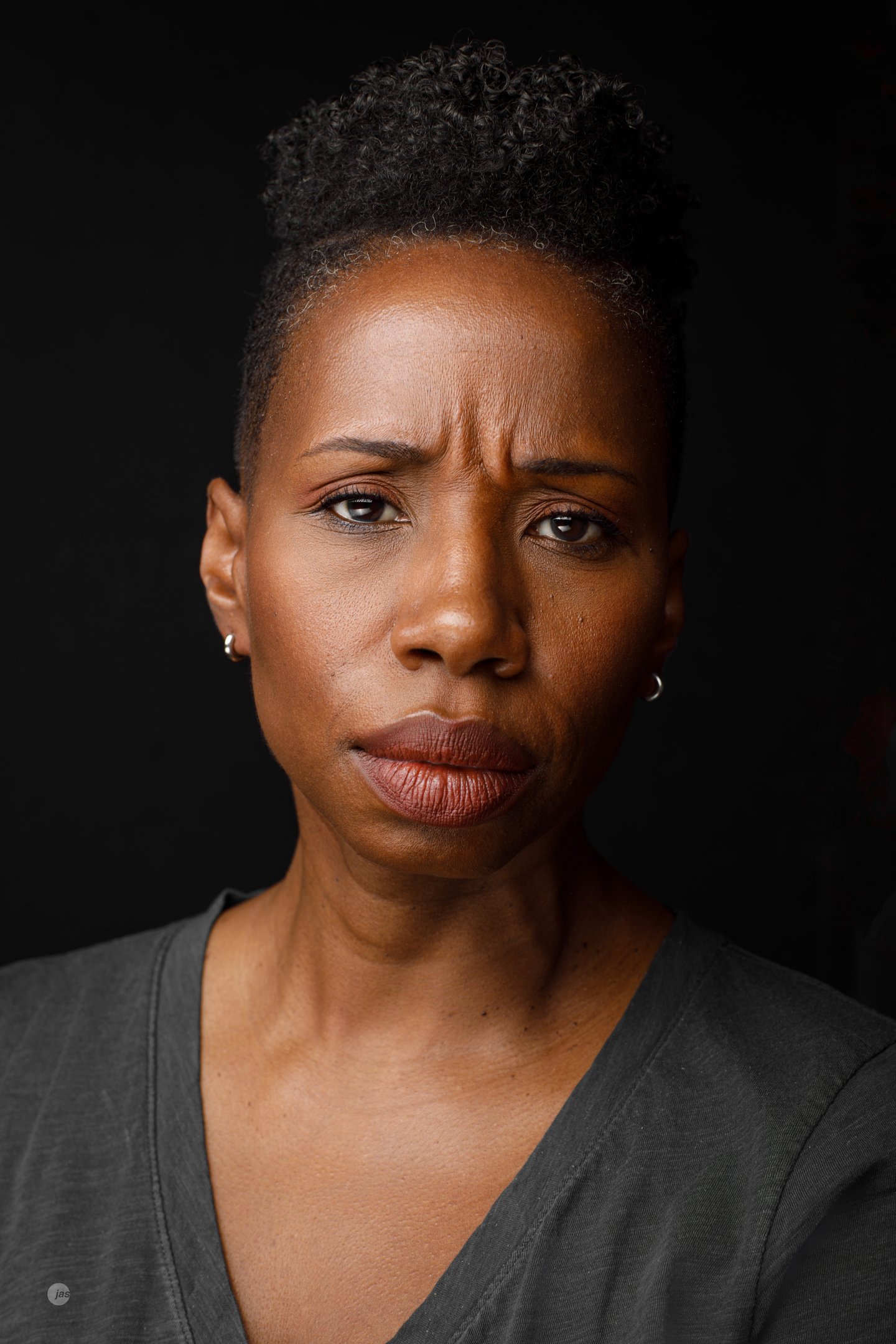 Headshot of Tracie Frank with a serious, concerned expression.