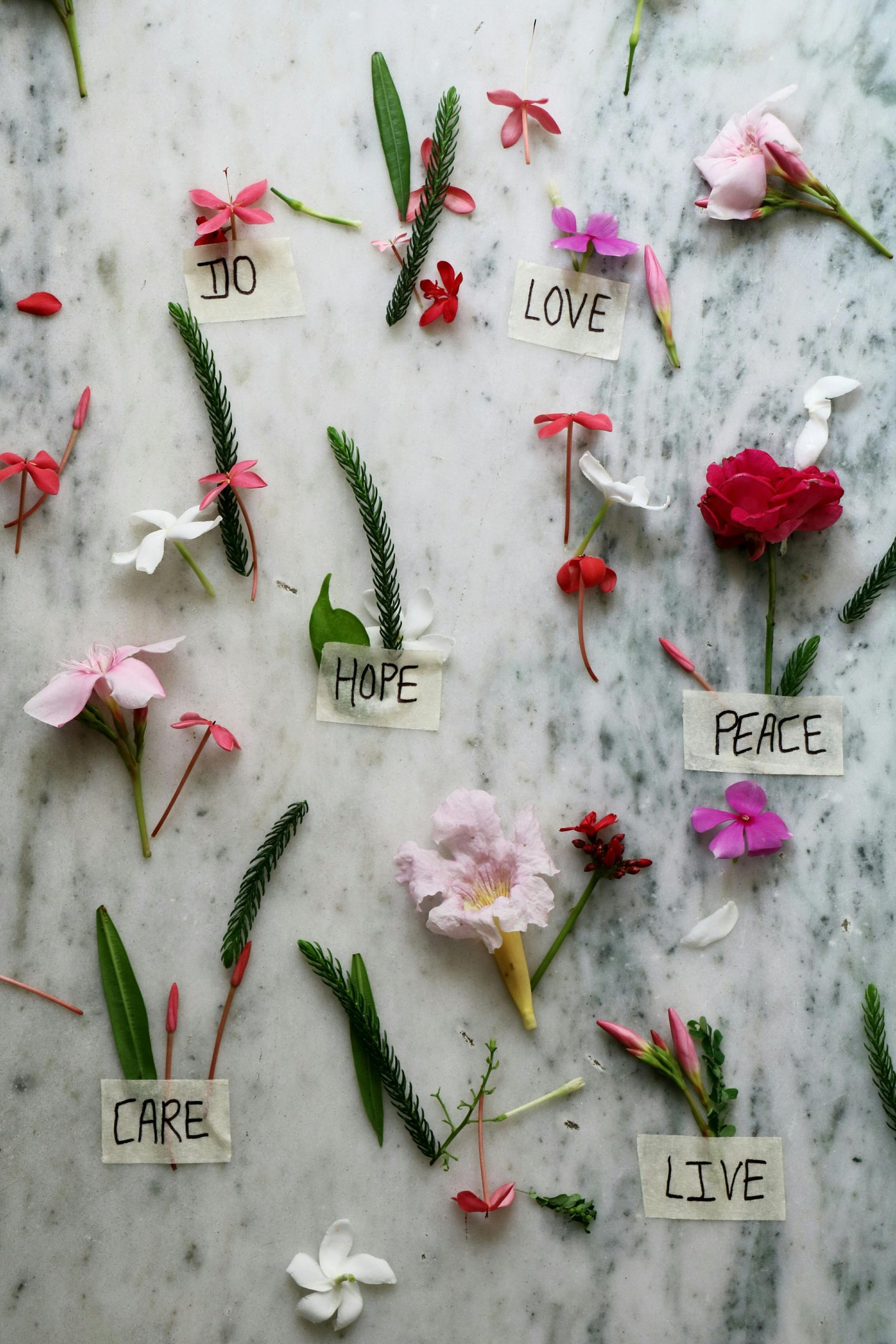 a table with flowers and words on it