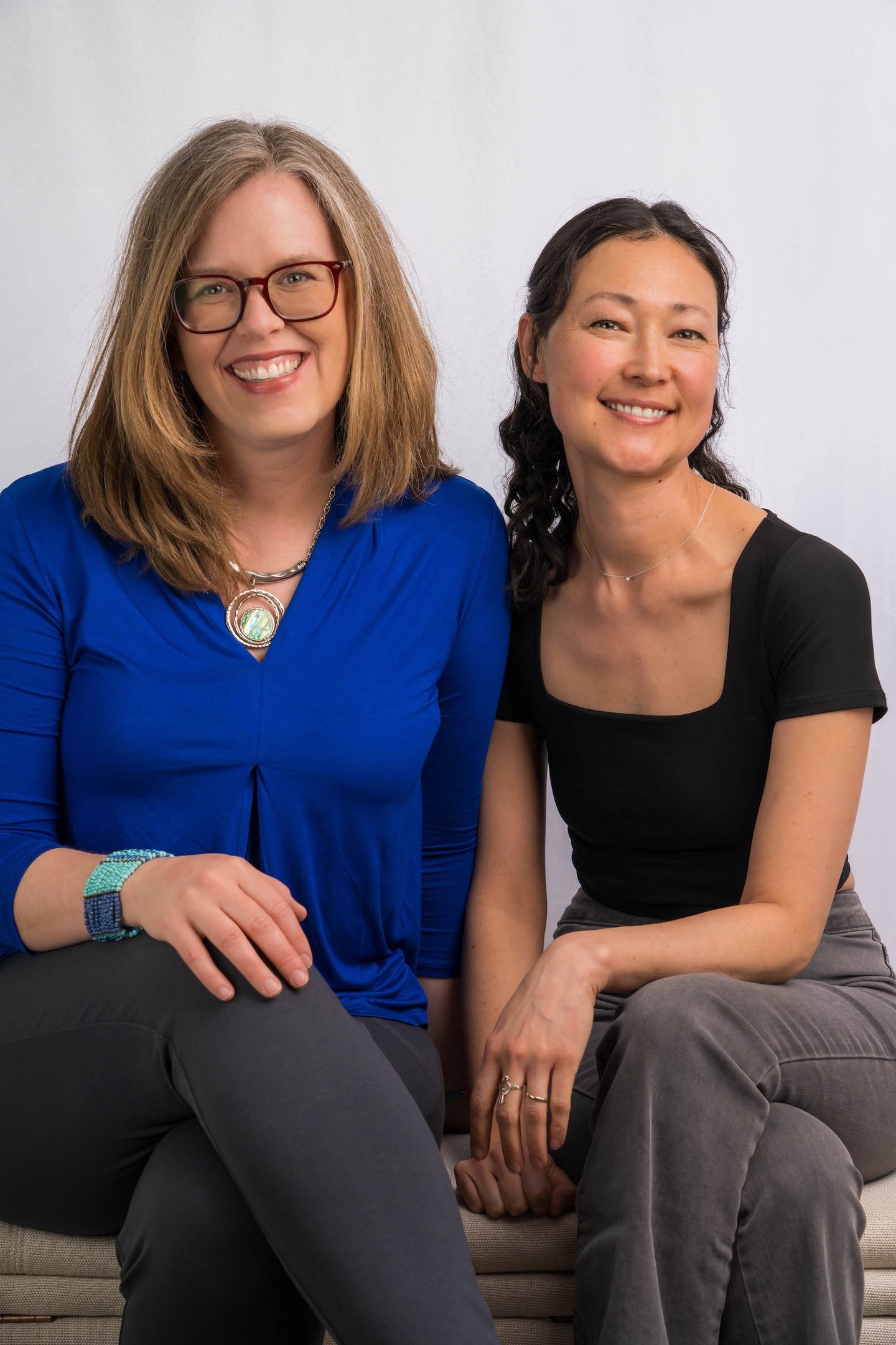 Head shot of two Canadian composers, Beth Hamilton and Jen Smith Lanthier smiling at the camera
