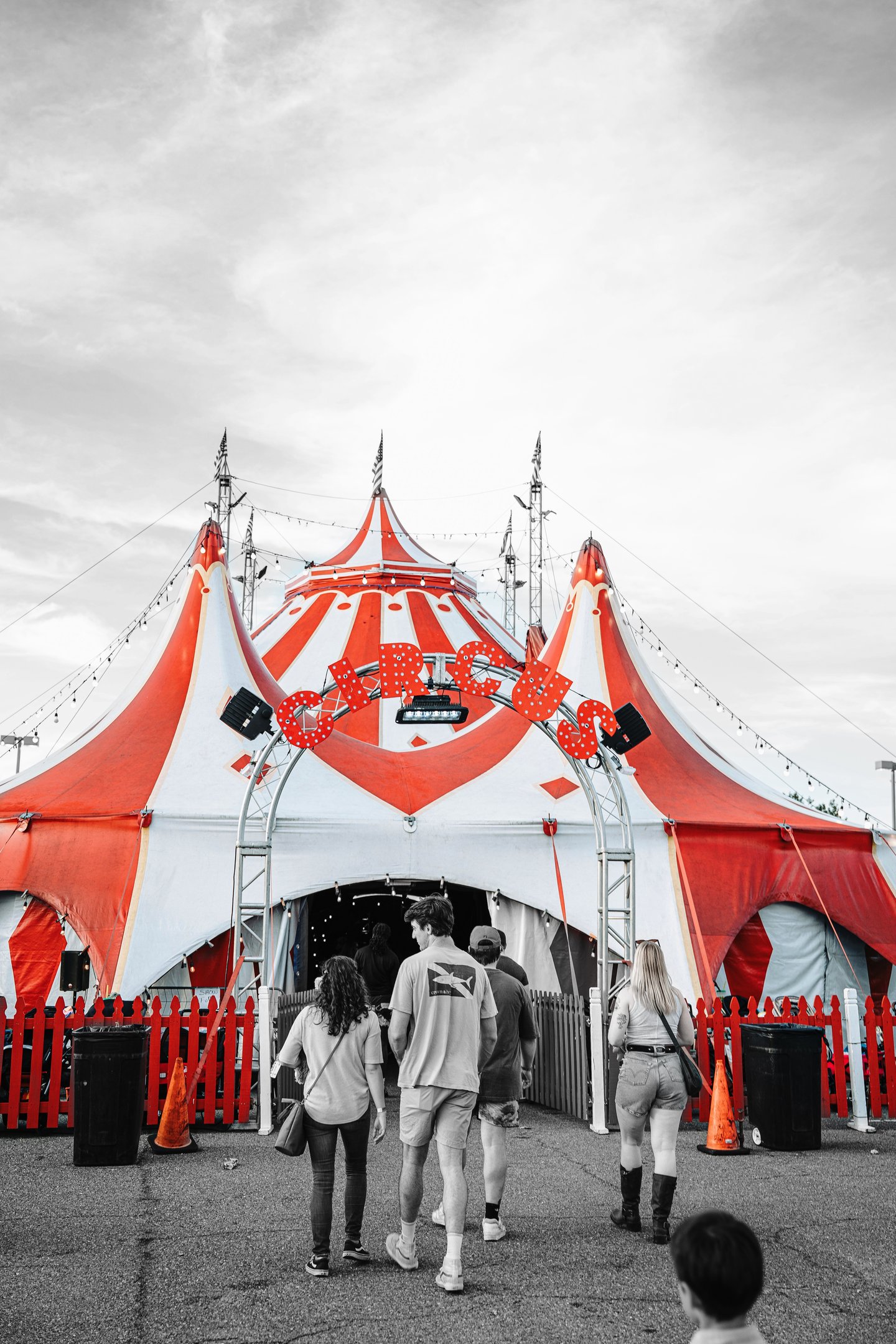 a circus tent with people walking around it