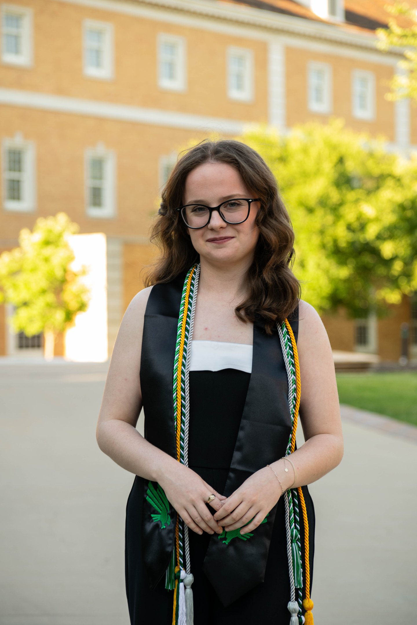 Girl Standing in Graduation Regalia