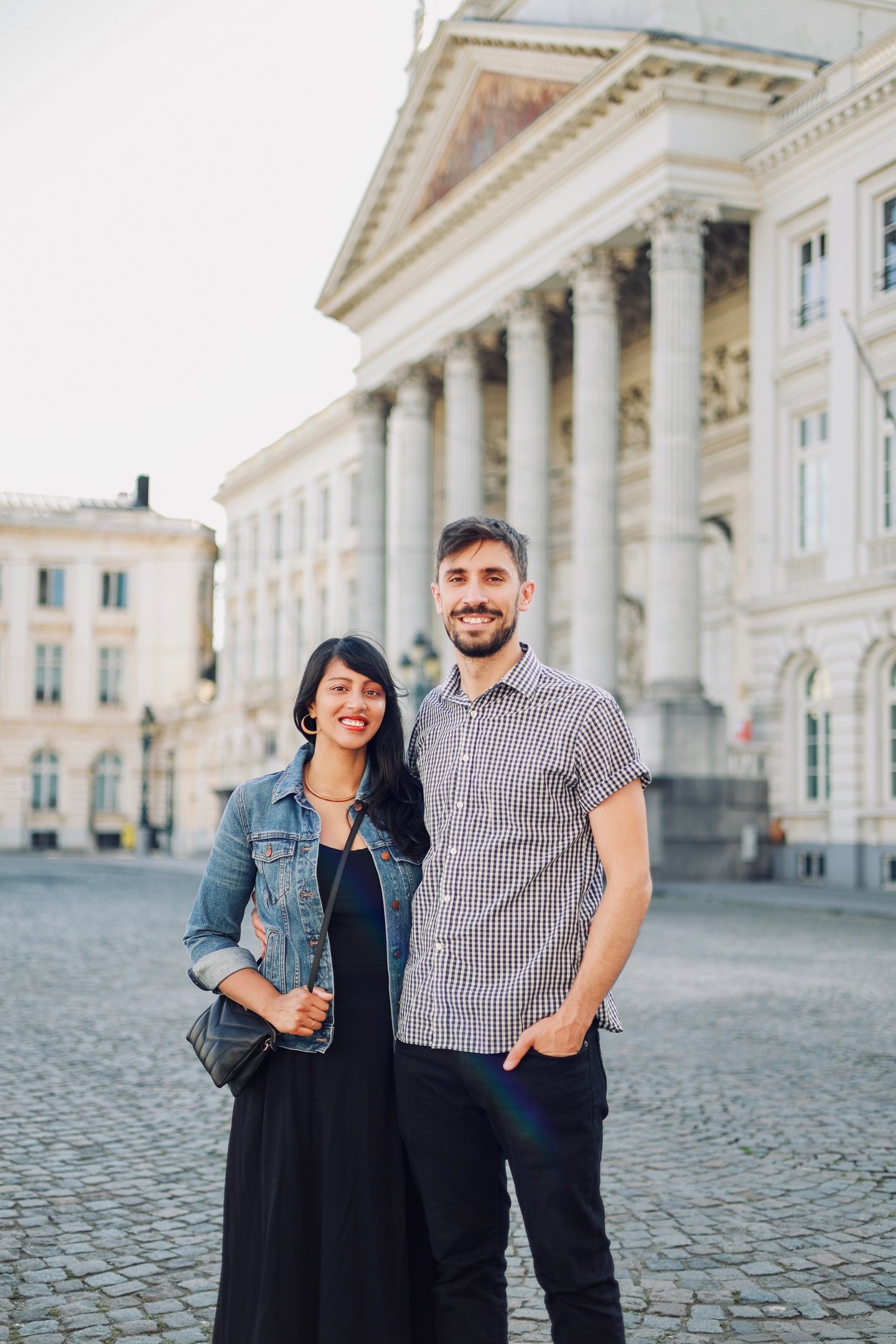 Venture Along founders posed outdoors in a European city