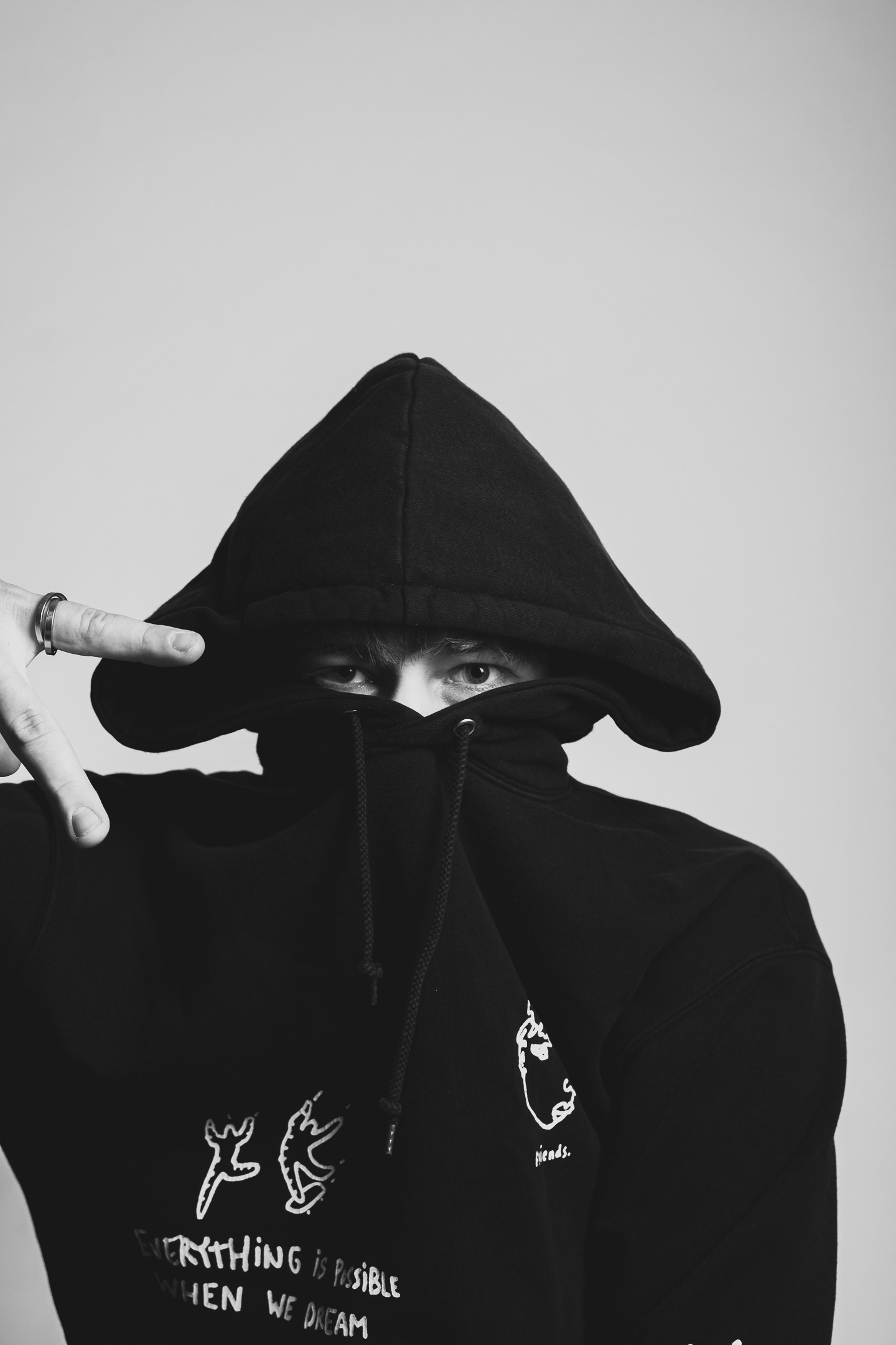 portrait of a man in a black hoodie with a hoodie on