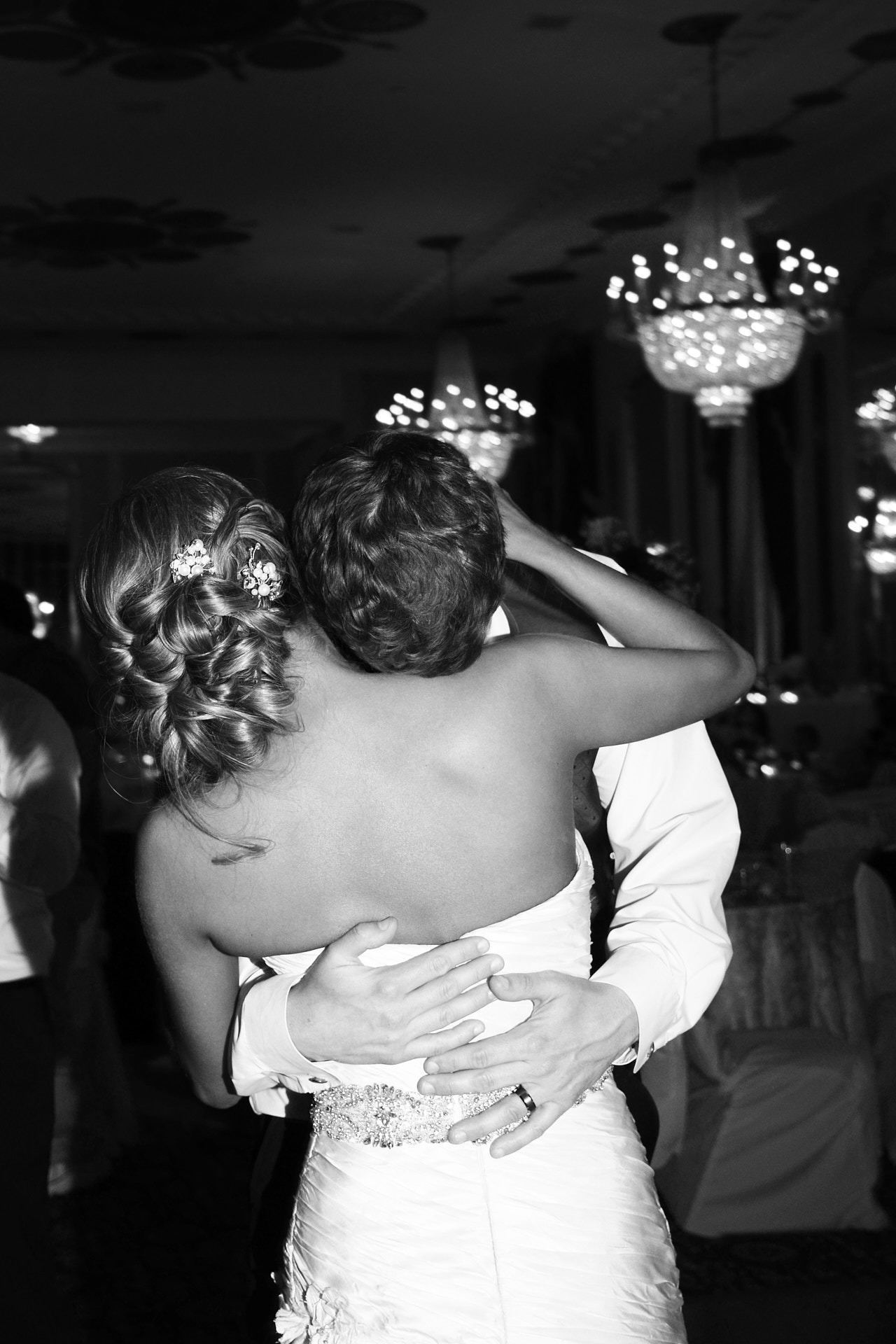 a bride and groom dancing at their wedding reception